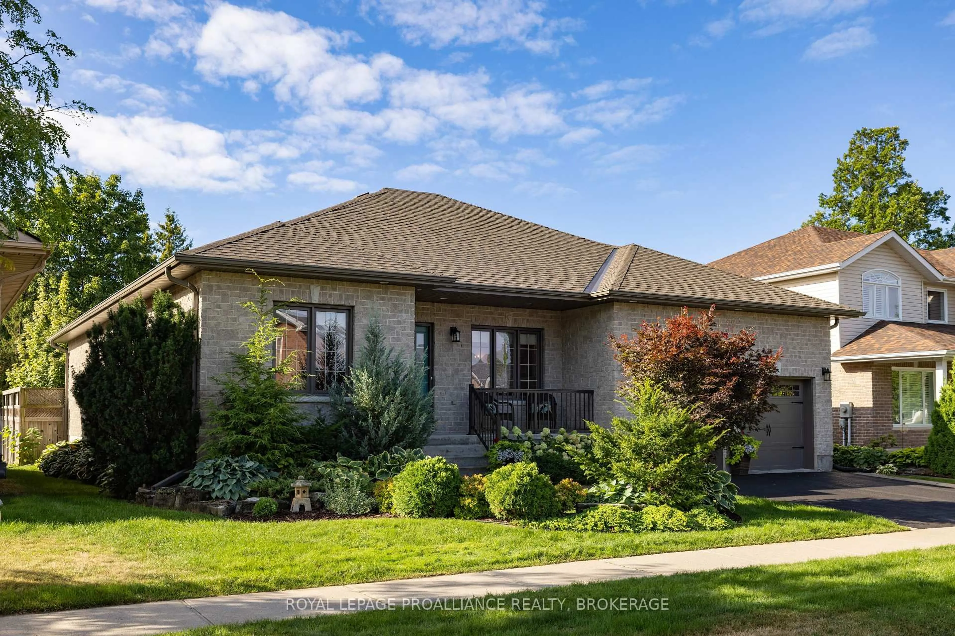 Home with brick exterior material, street for 387 Honeywood Ave, Kingston Ontario K7K 7L3