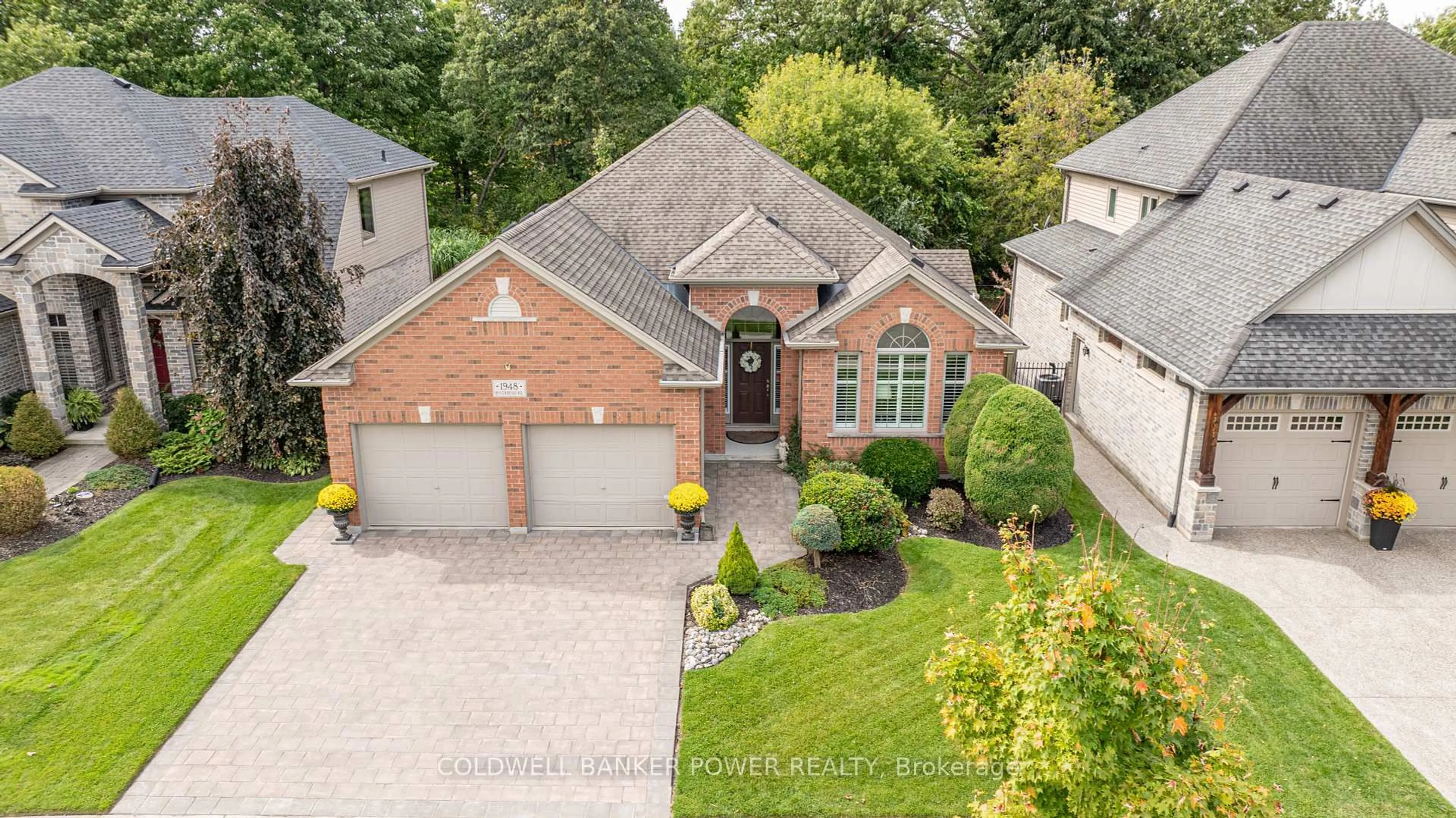A pic from outside/outdoor area/front of a property/back of a property/a pic from drone, street for 1948 Riverbend Rd, London South Ontario N6K 0A2