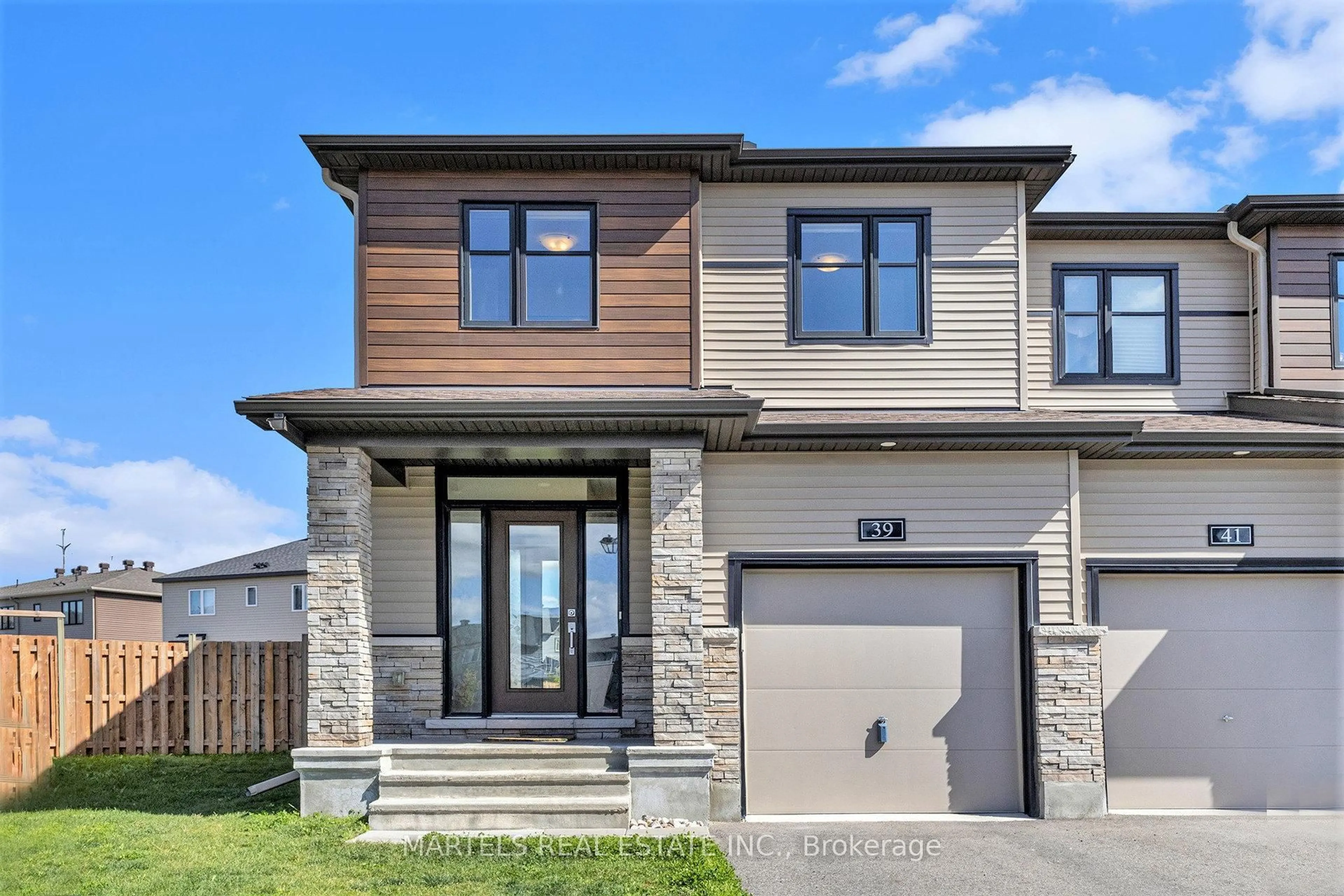 Home with brick exterior material, street for 39 Watchim St, Orleans Ontario K4A 5K6