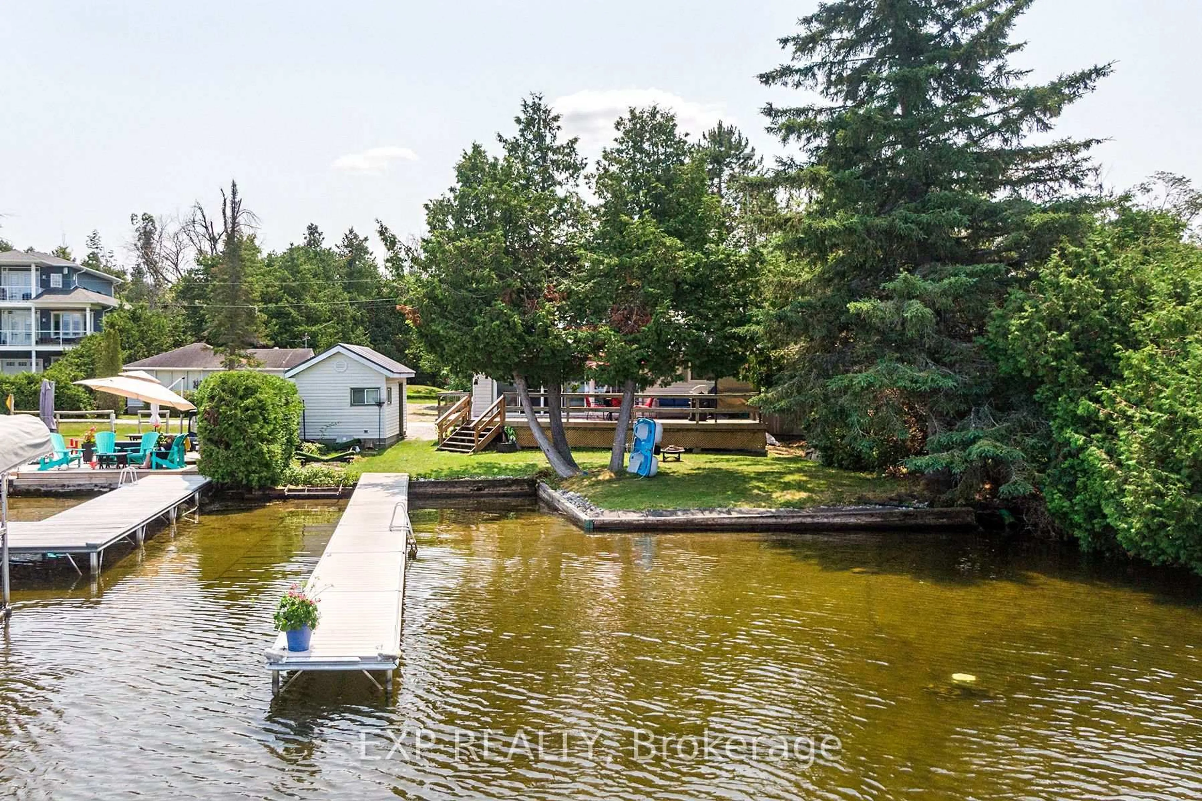 A pic from outside/outdoor area/front of a property/back of a property/a pic from drone, water/lake/river/ocean view for 12 Cedar Point Rd, Kawartha Lakes Ontario K0M 1G0