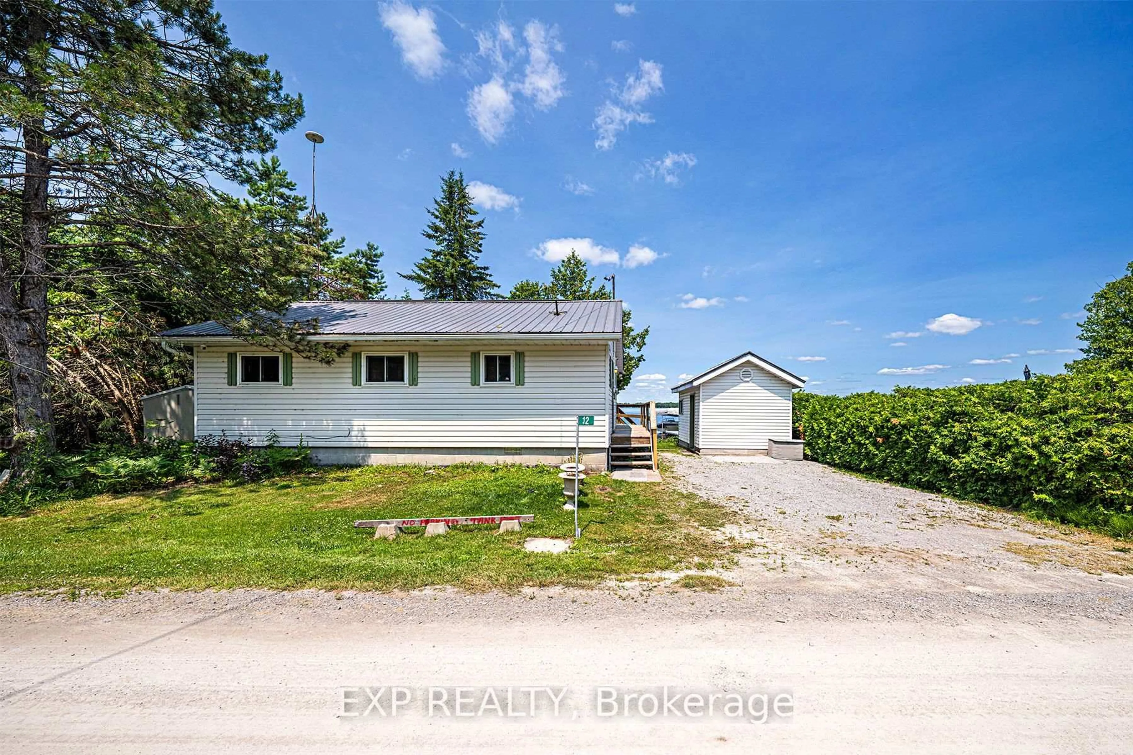 A pic from outside/outdoor area/front of a property/back of a property/a pic from drone, unknown for 12 Cedar Point Rd, Kawartha Lakes Ontario K0M 1G0