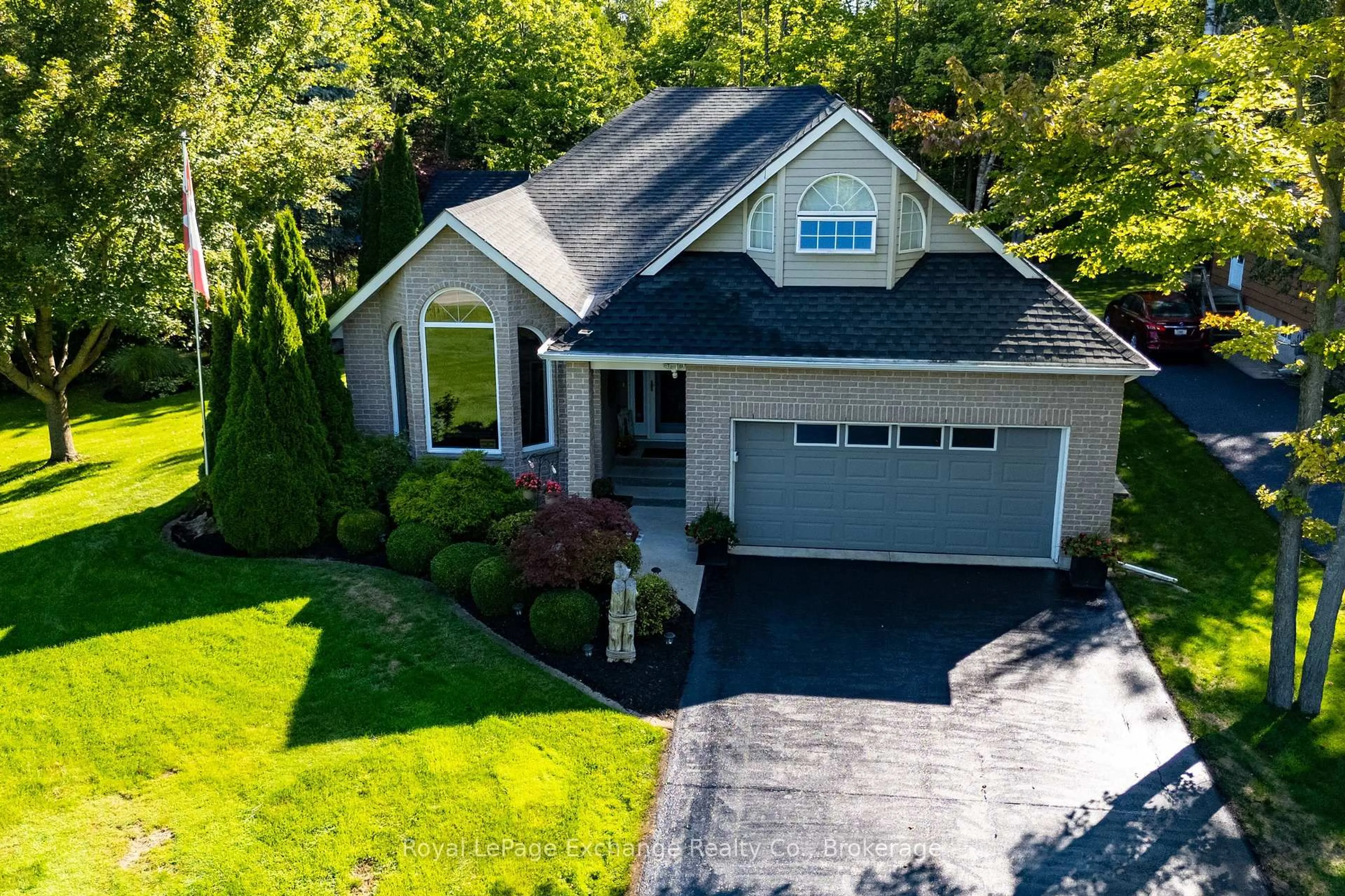 A pic from outside/outdoor area/front of a property/back of a property/a pic from drone, street for 210 Miramichi Bay Rd, Saugeen Shores Ontario N0H 2C6