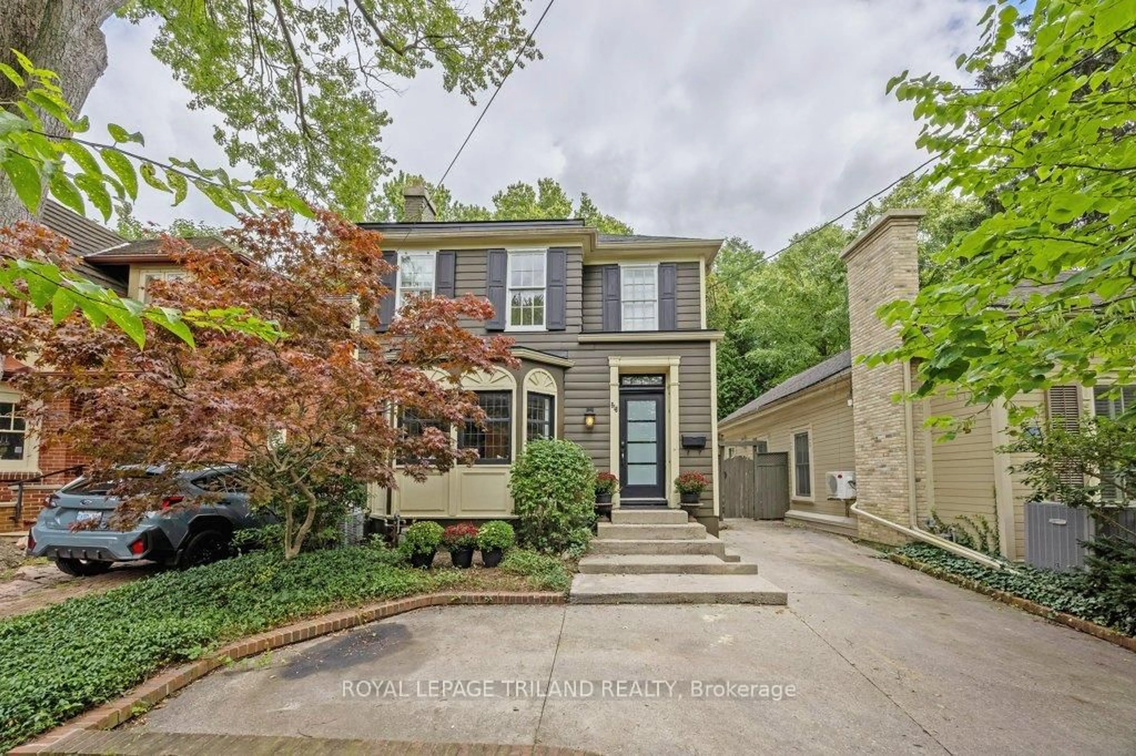 Home with brick exterior material, street for 818 Talbot St, London East Ontario N6A 2V8