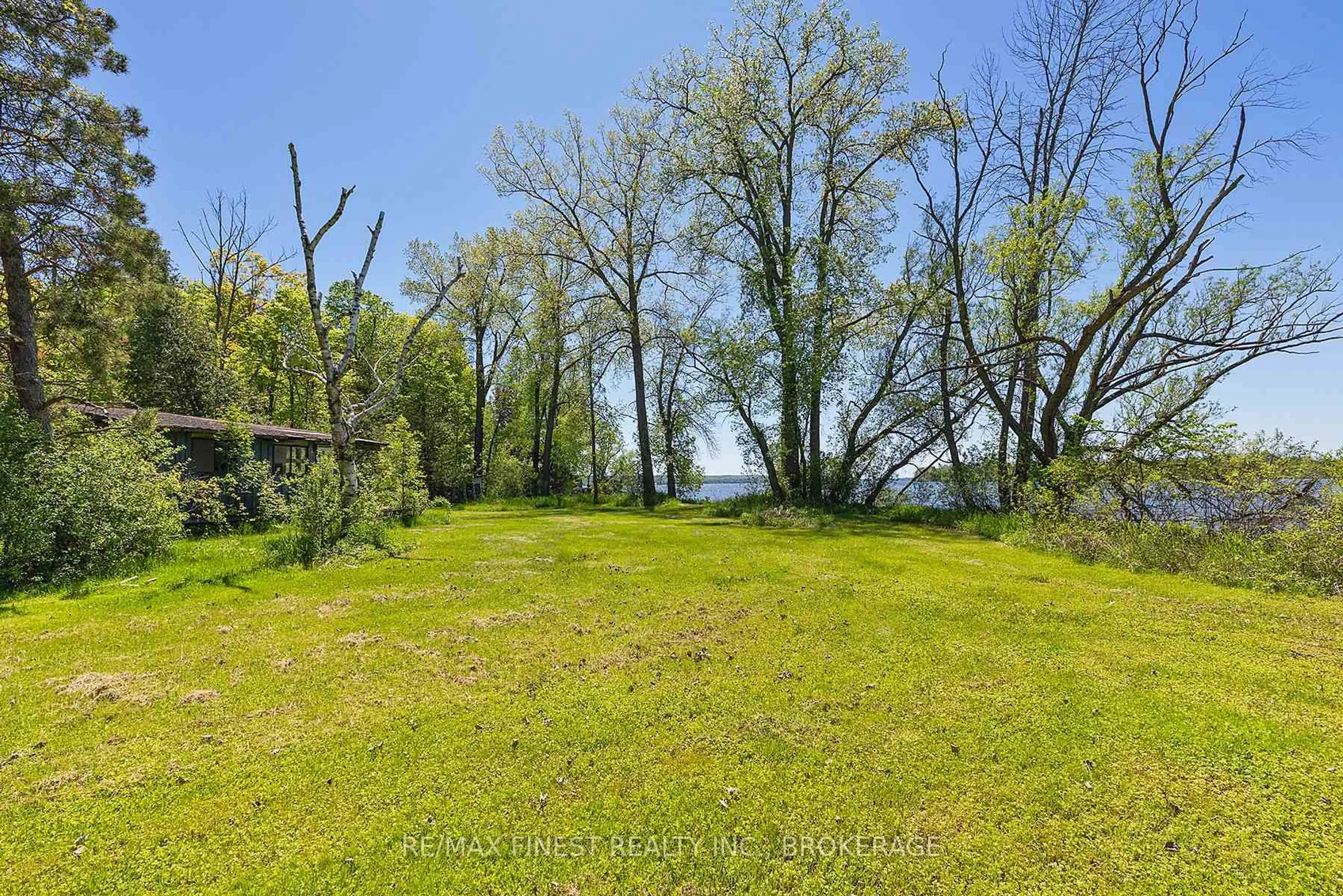 A pic from outside/outdoor area/front of a property/back of a property/a pic from drone, water/lake/river/ocean view for 212 Perch Cove Lane, Napanee Ontario K7R 3K7