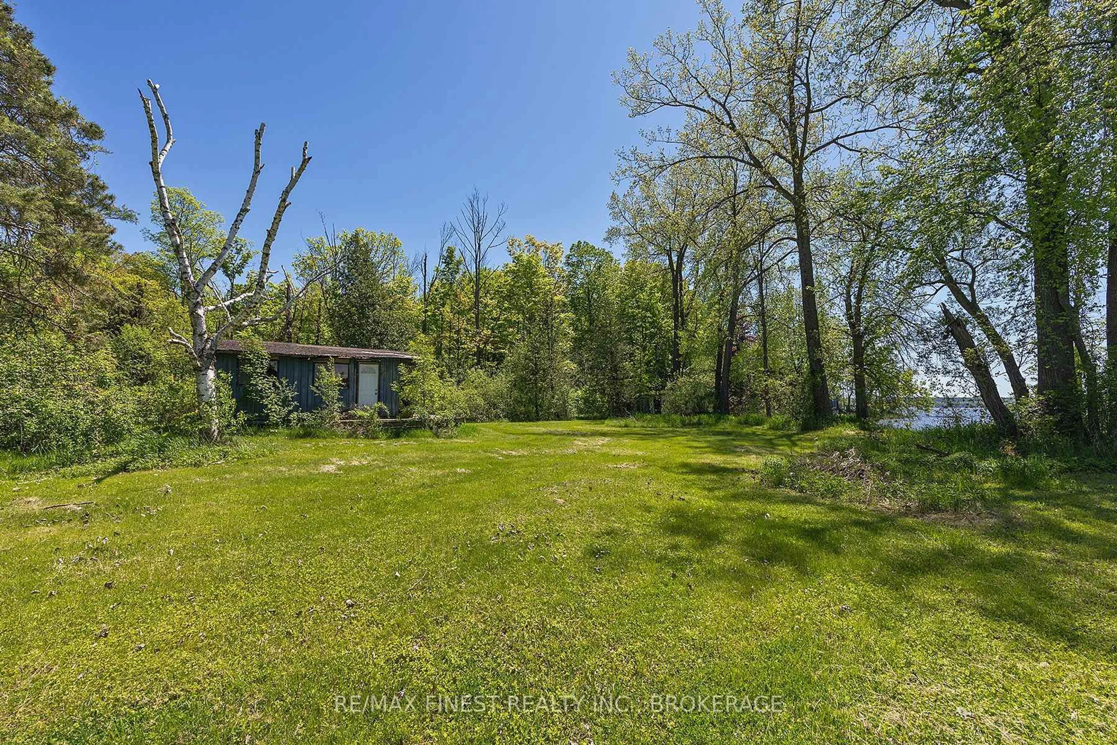 A pic from outside/outdoor area/front of a property/back of a property/a pic from drone, water/lake/river/ocean view for 212 Perch Cove Lane, Napanee Ontario K7R 3K7