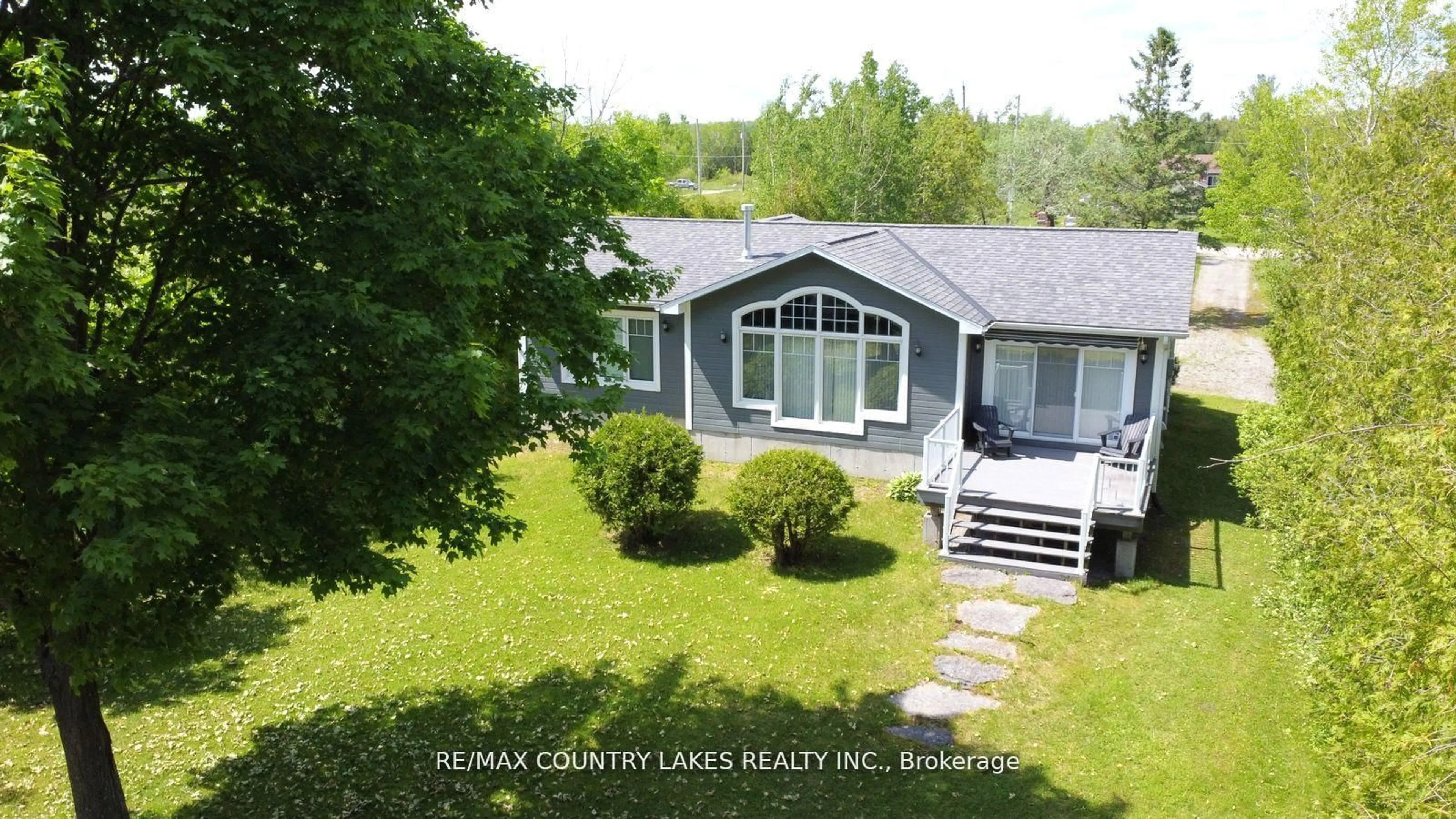 A pic from outside/outdoor area/front of a property/back of a property/a pic from drone, water/lake/river/ocean view for 275 Mcguire Beach Rd, Kawartha Lakes Ontario K0M 2B0