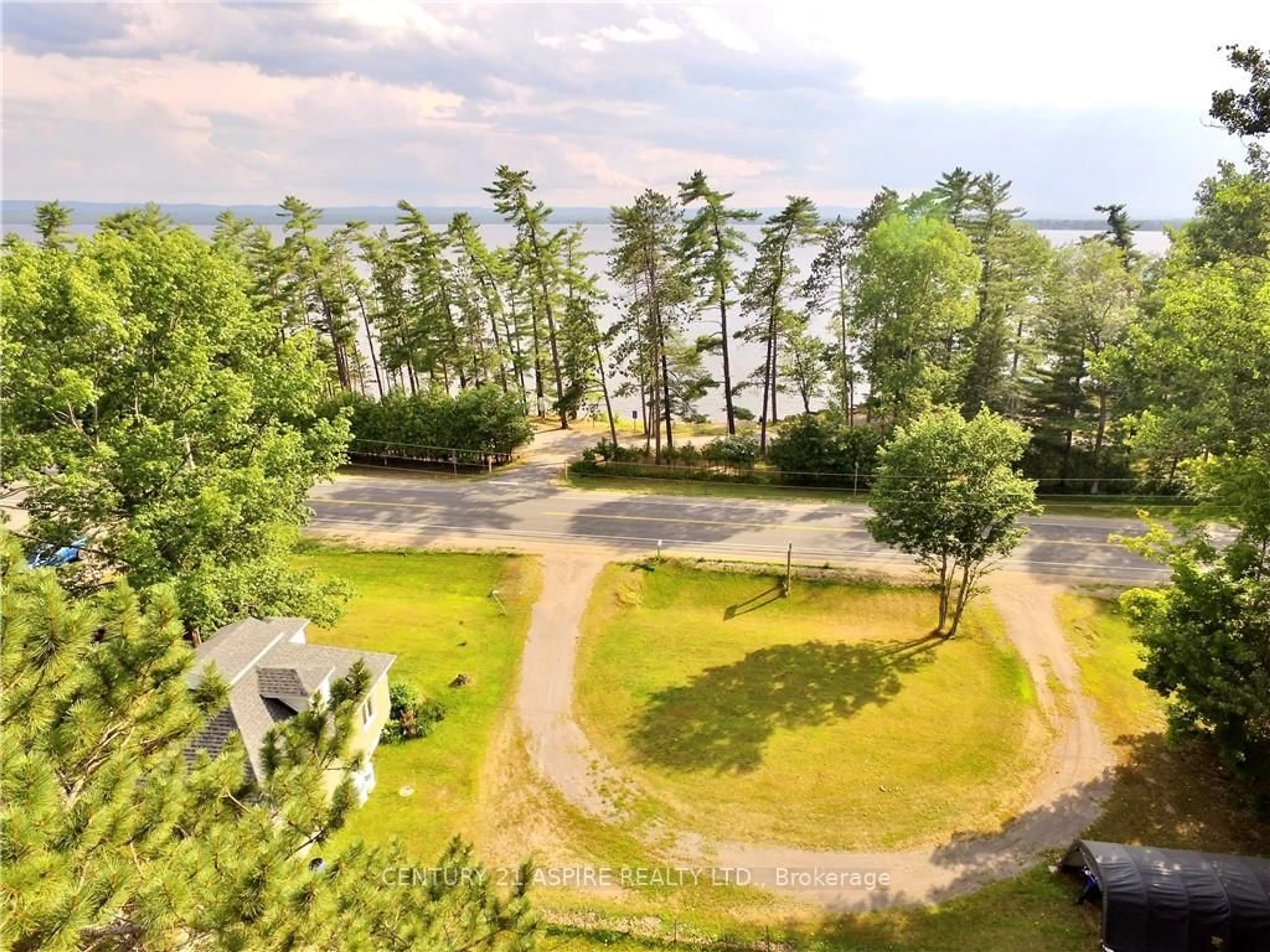 A pic from outside/outdoor area/front of a property/back of a property/a pic from drone, water/lake/river/ocean view for 13314 60 Highway, Golden Lake Ontario K0J 1X0