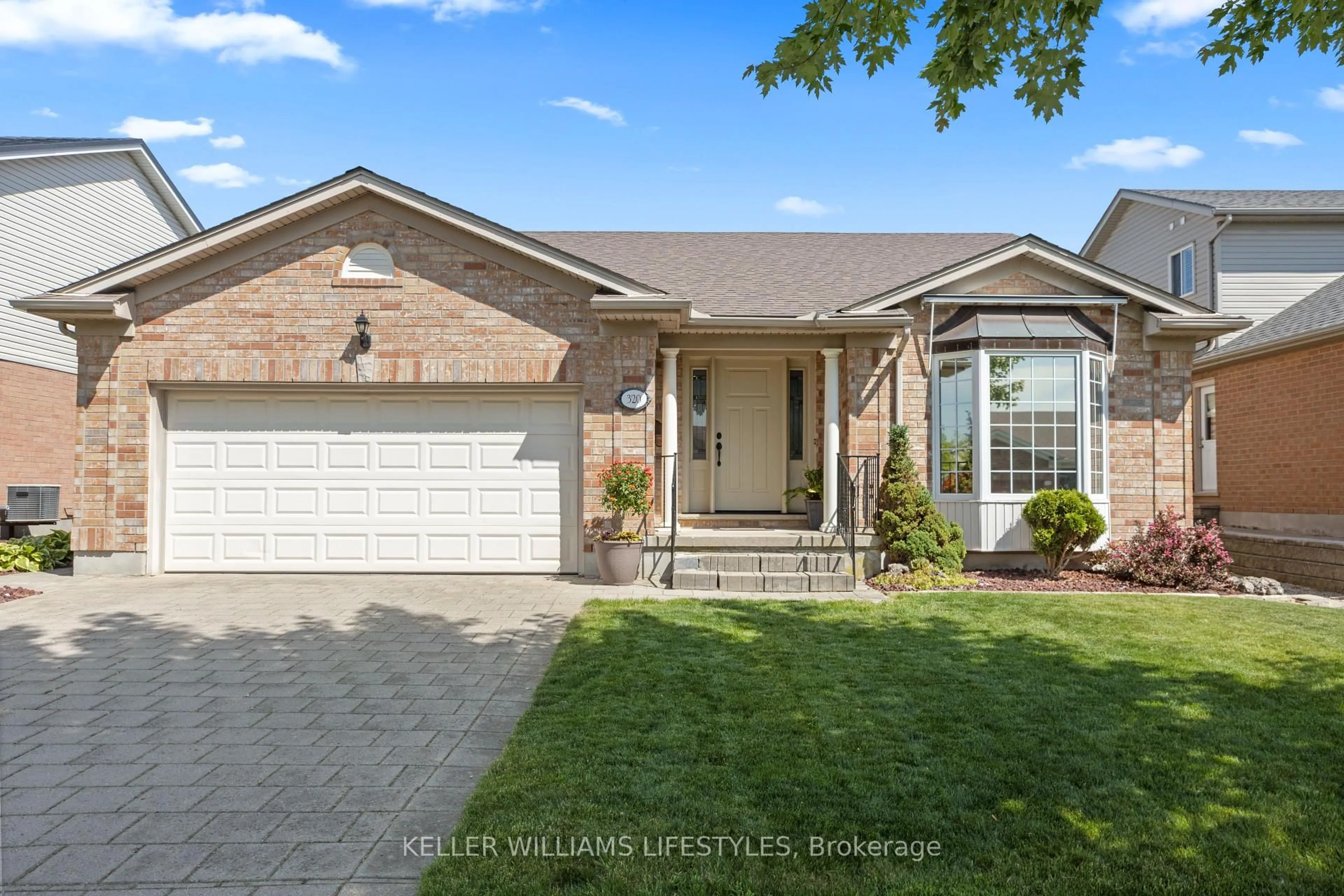 Home with brick exterior material, street for 320 Mcgarrell Dr, London North Ontario N6G 5E9