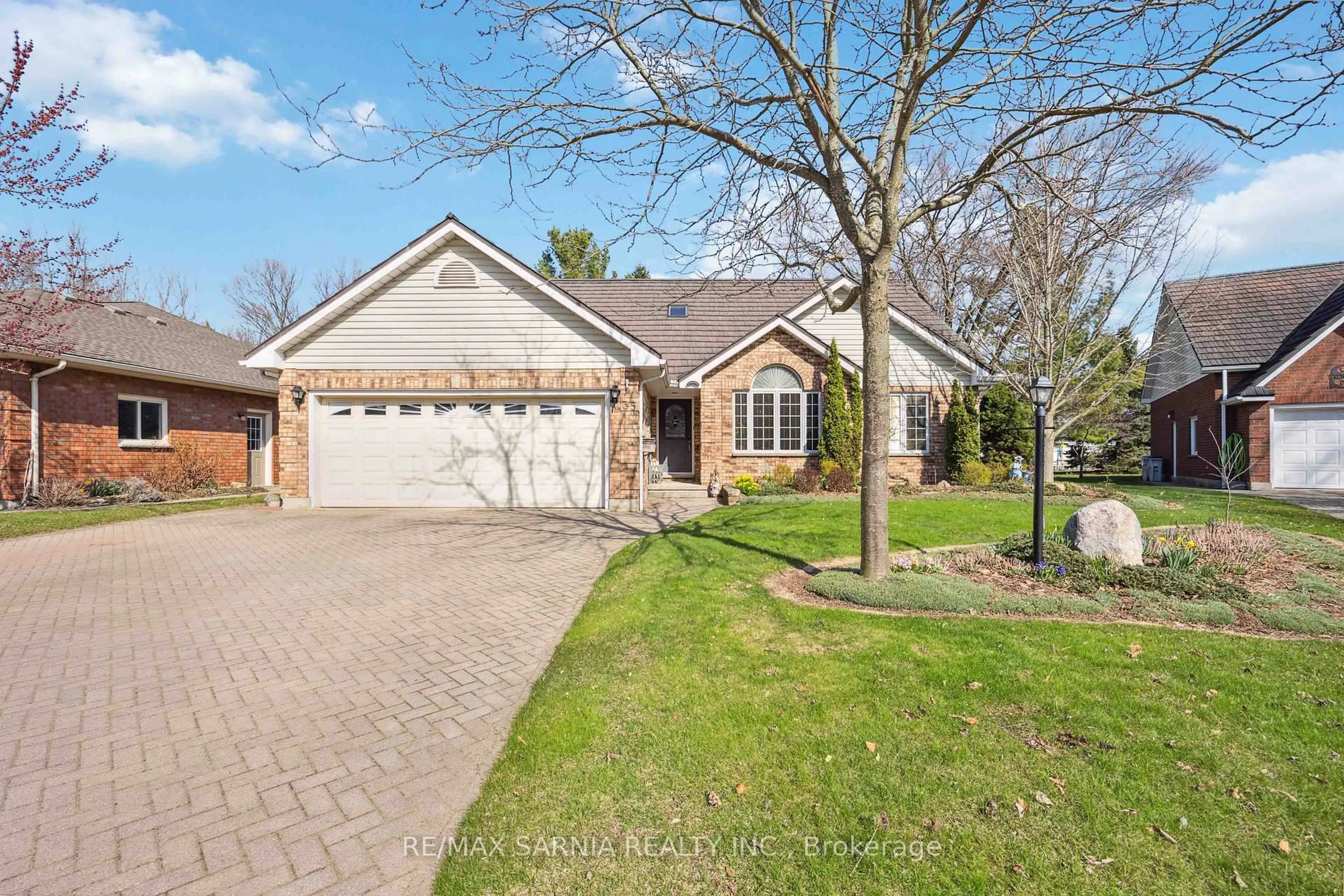 Home with brick exterior material, street for 35 Frances Dr, Lambton Shores Ontario N0N 1J0