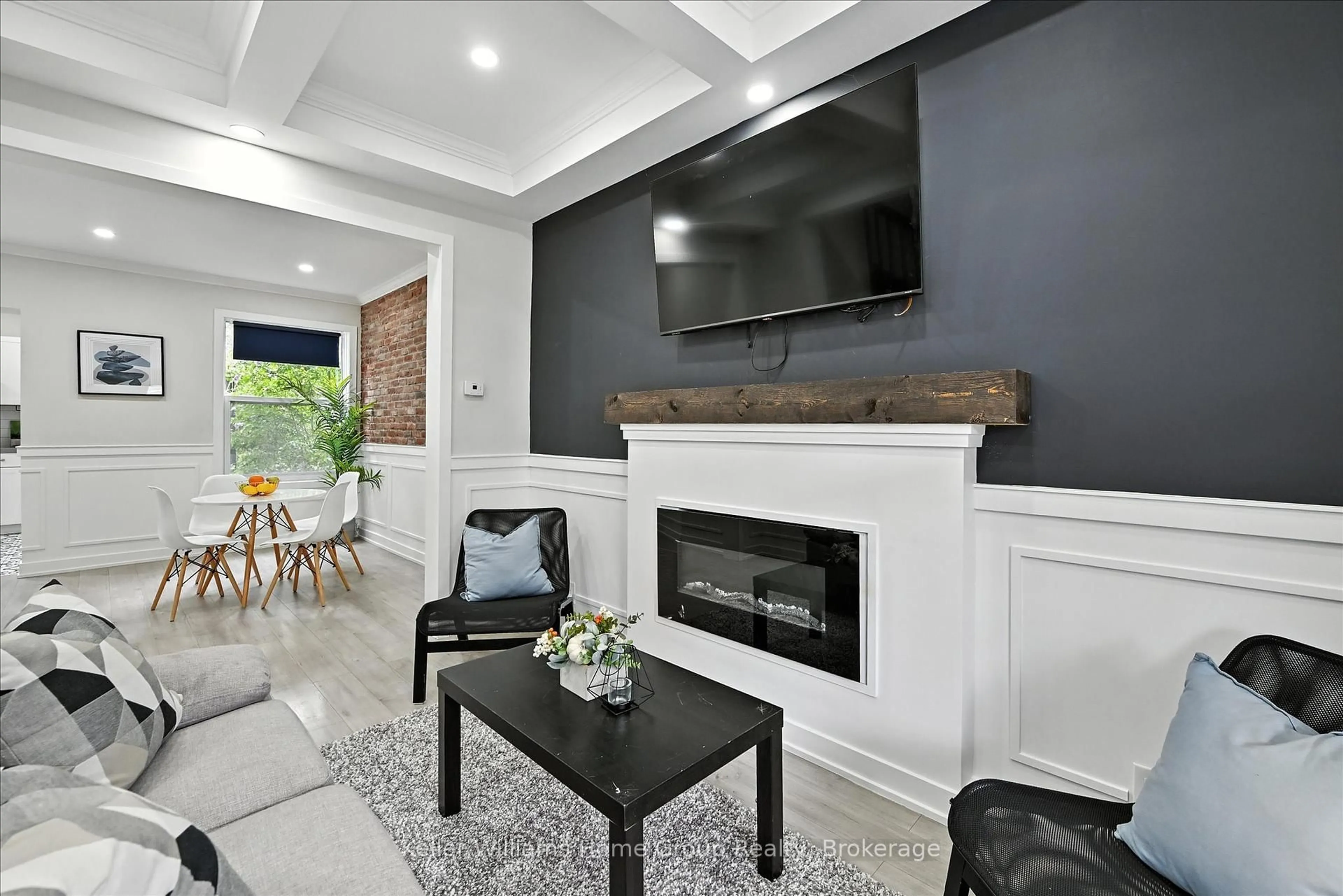 Living room with furniture, ceramic/tile floor for 82 Rosemont Ave, Hamilton Ontario L8L 2M5