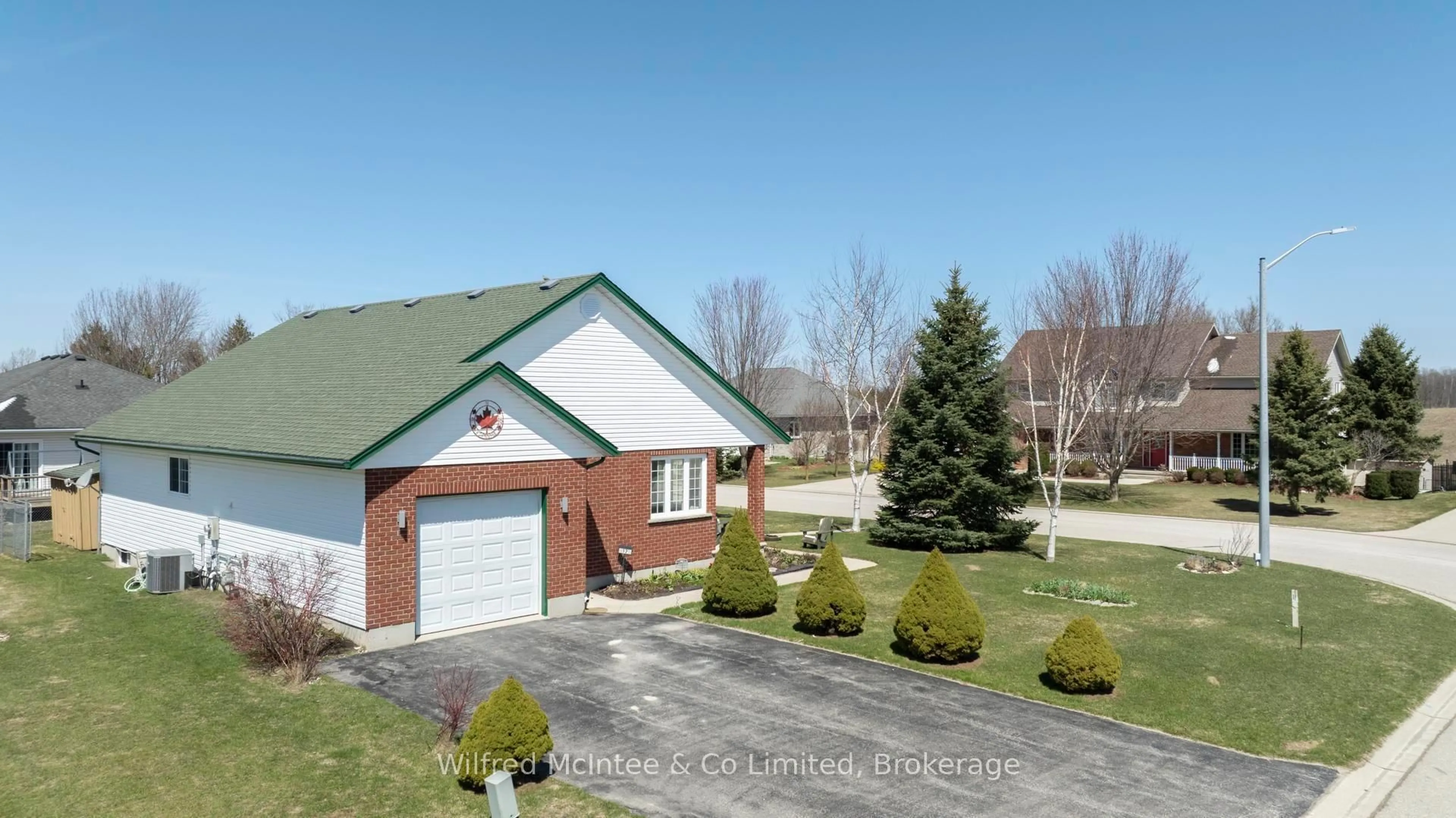 A pic from outside/outdoor area/front of a property/back of a property/a pic from drone, street for 12 Jonathan Cres, South Bruce Ontario N0G 2J0
