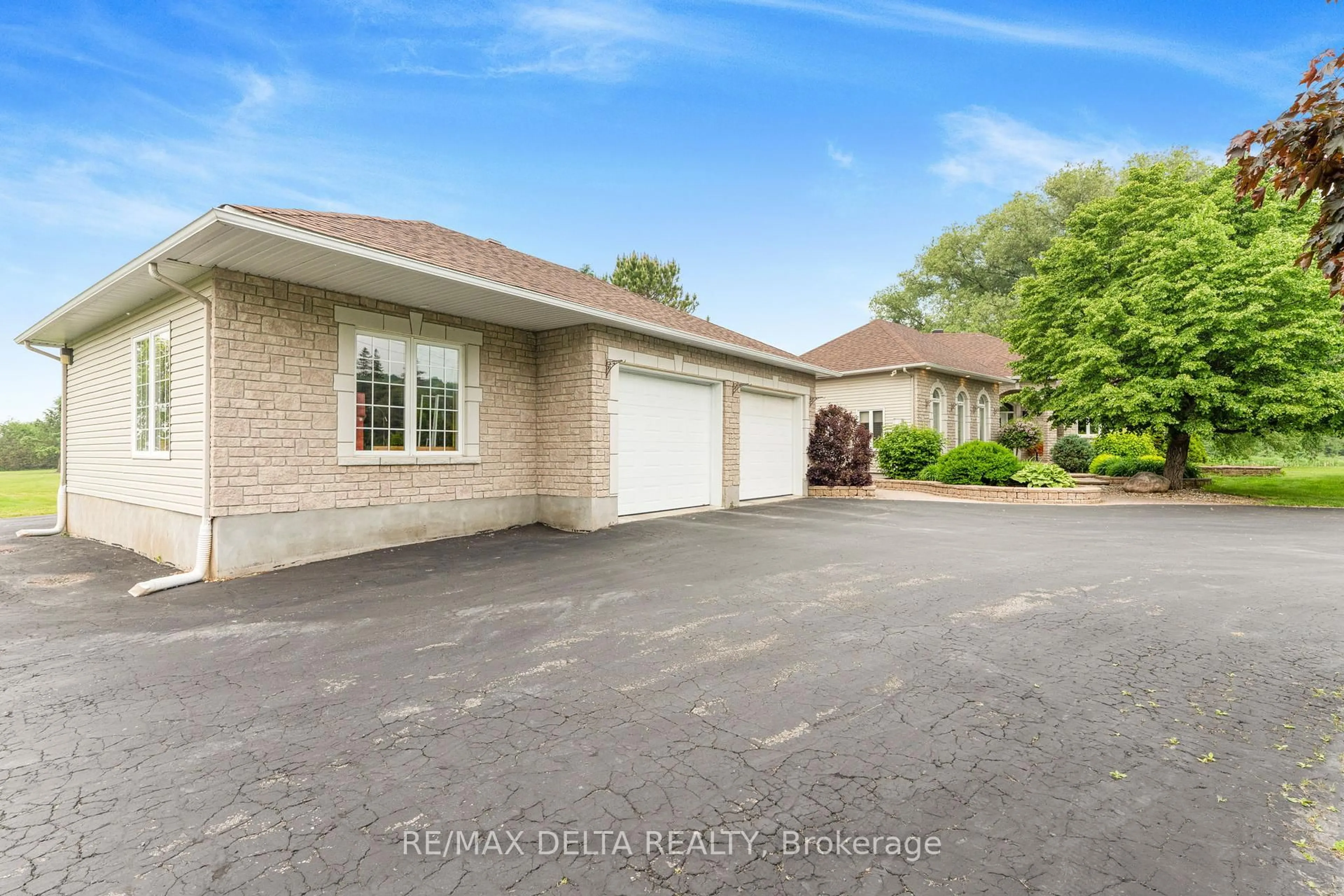 A pic from outside/outdoor area/front of a property/back of a property/a pic from drone, water/lake/river/ocean view for 1819 Baseline Rd, Clarence-Rockland Ontario K0A 1N0