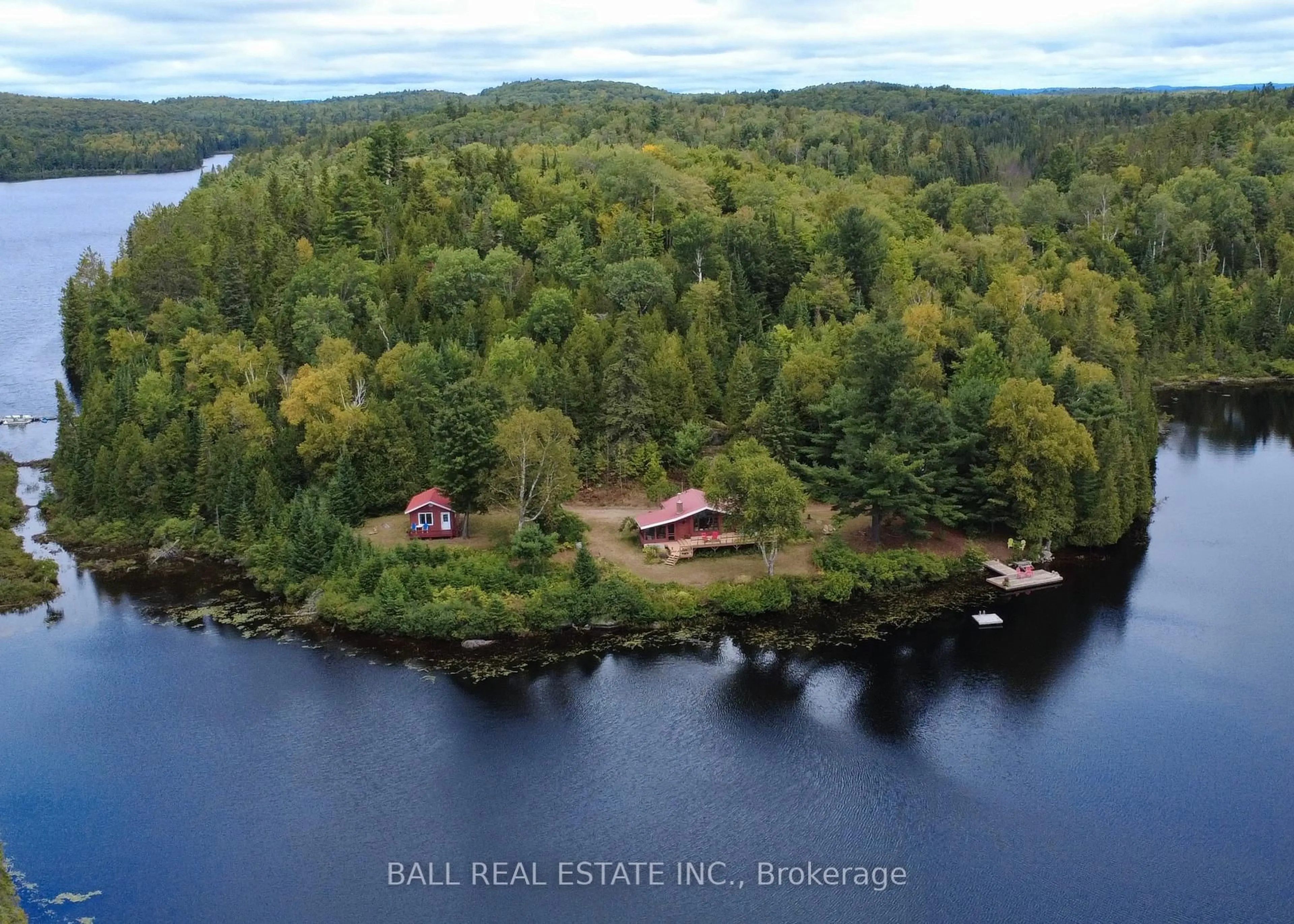 A pic from outside/outdoor area/front of a property/back of a property/a pic from drone, water/lake/river/ocean view for 198 Davies Lane, South Algonquin Ontario K0K 2M0