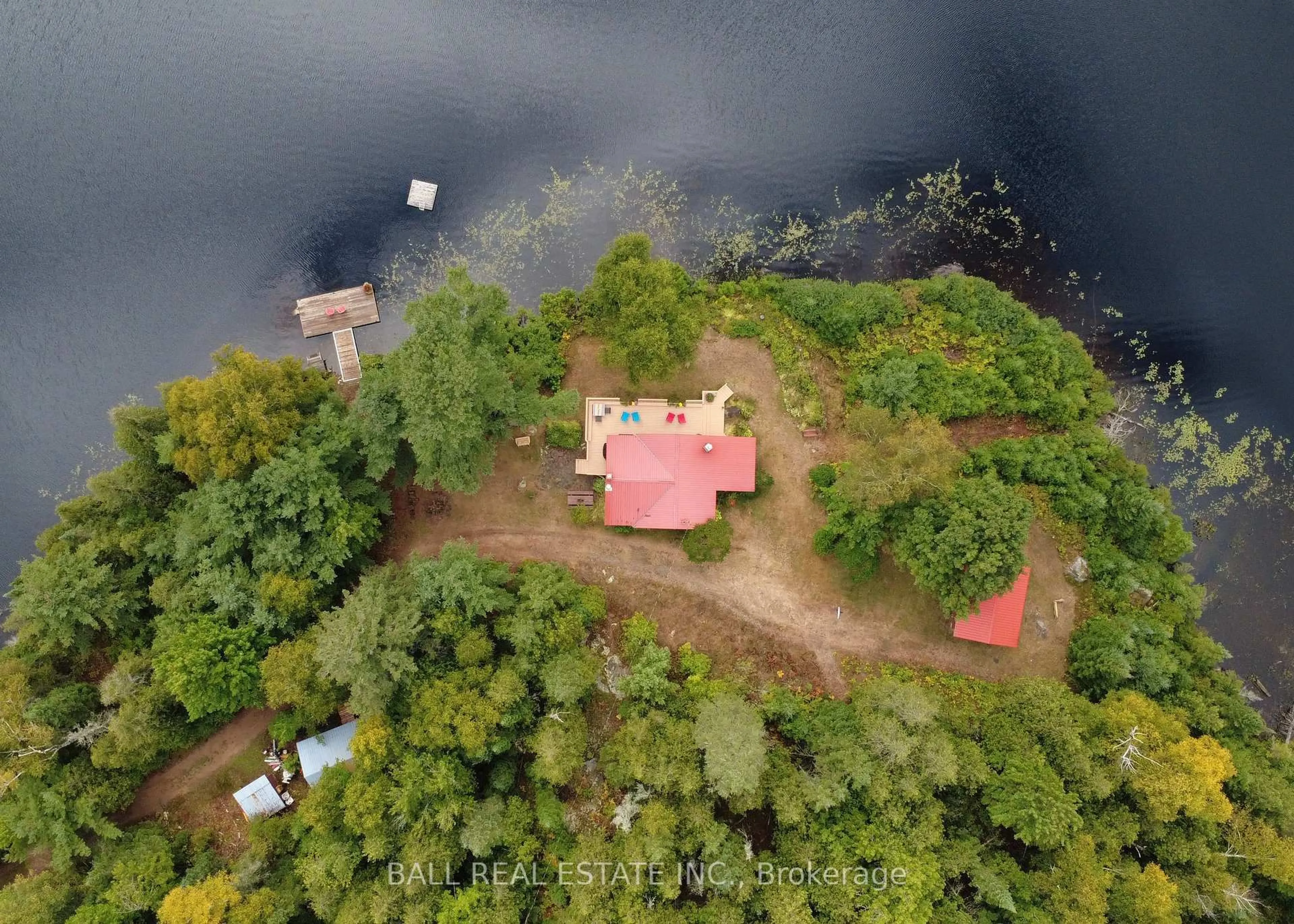 A pic from outside/outdoor area/front of a property/back of a property/a pic from drone, water/lake/river/ocean view for 198 Davies Lane, South Algonquin Ontario K0K 2M0