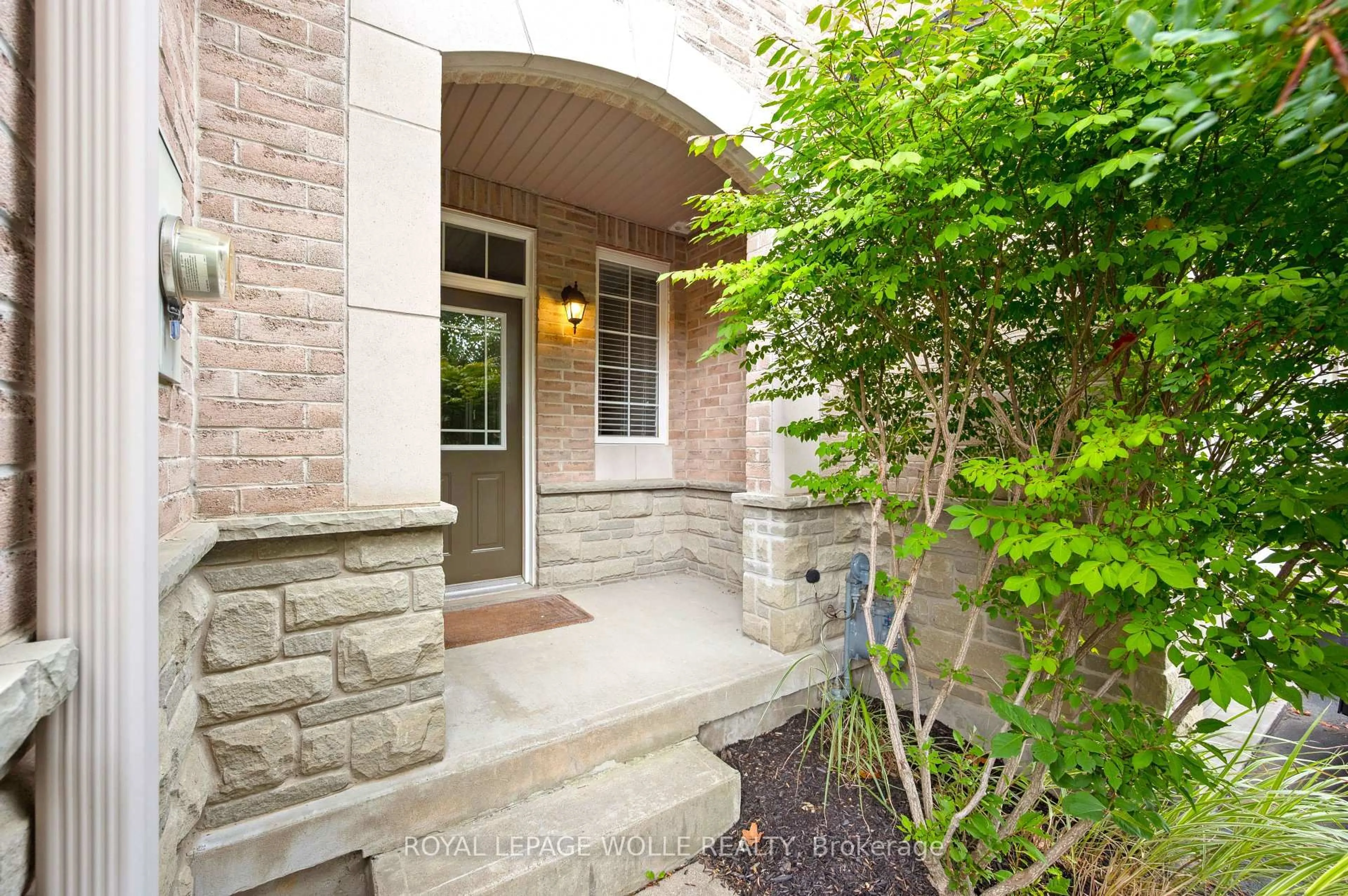 Home with brick exterior material, street for 28 Doon Mills Dr #9, Kitchener Ontario N2P 2W9