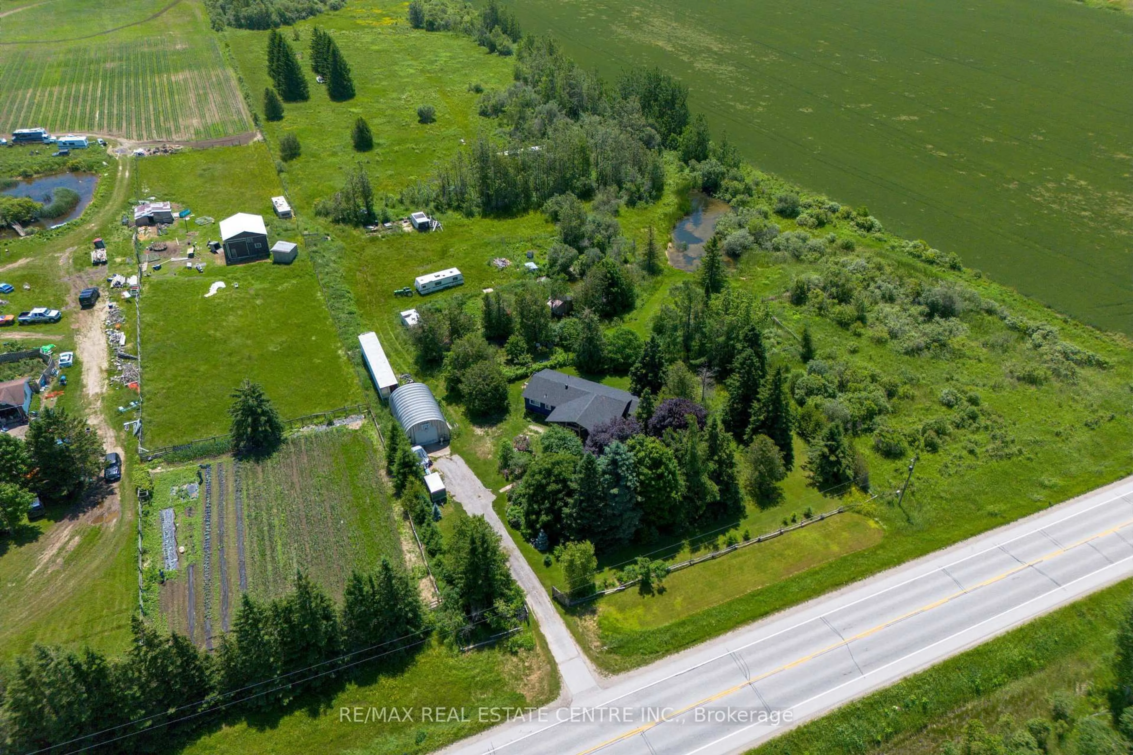 A pic from outside/outdoor area/front of a property/back of a property/a pic from drone, unknown for 180118 Grey Road 9 Rd, Southgate Ontario N0C 1B0