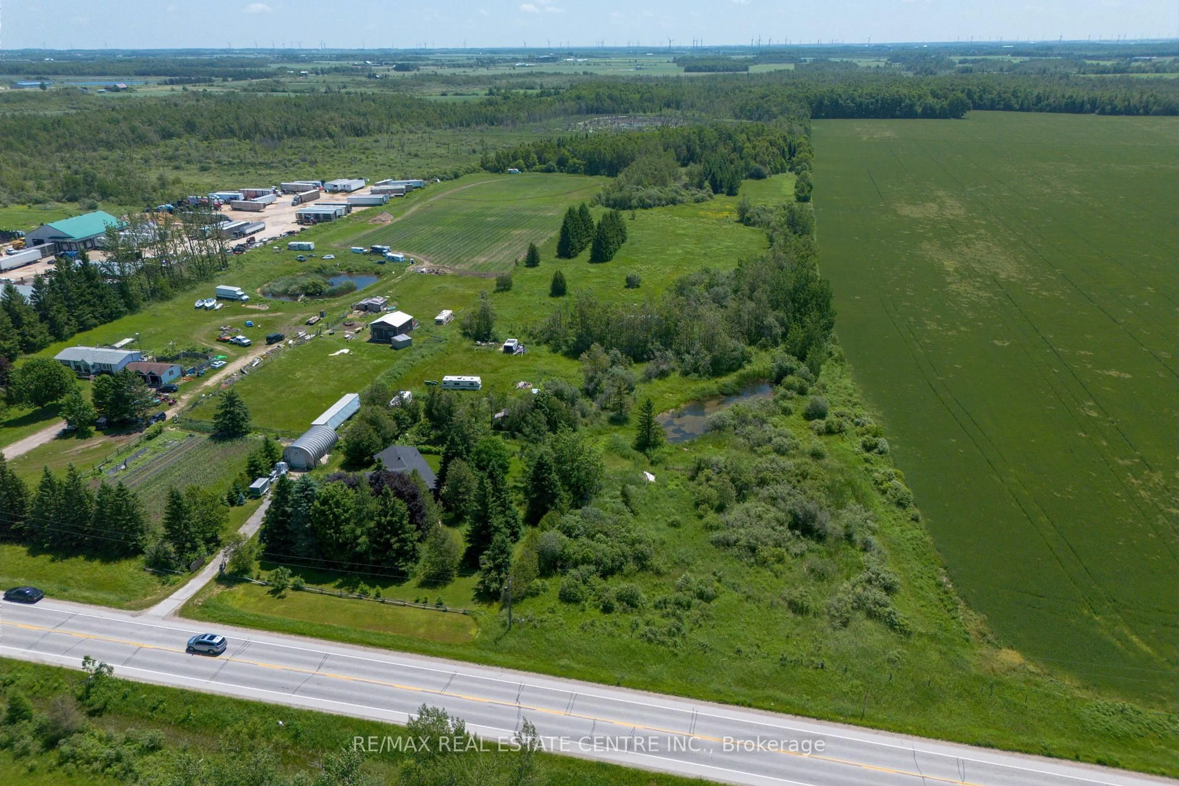 A pic from outside/outdoor area/front of a property/back of a property/a pic from drone, unknown for 180118 Grey Road 9 Rd, Southgate Ontario N0C 1B0