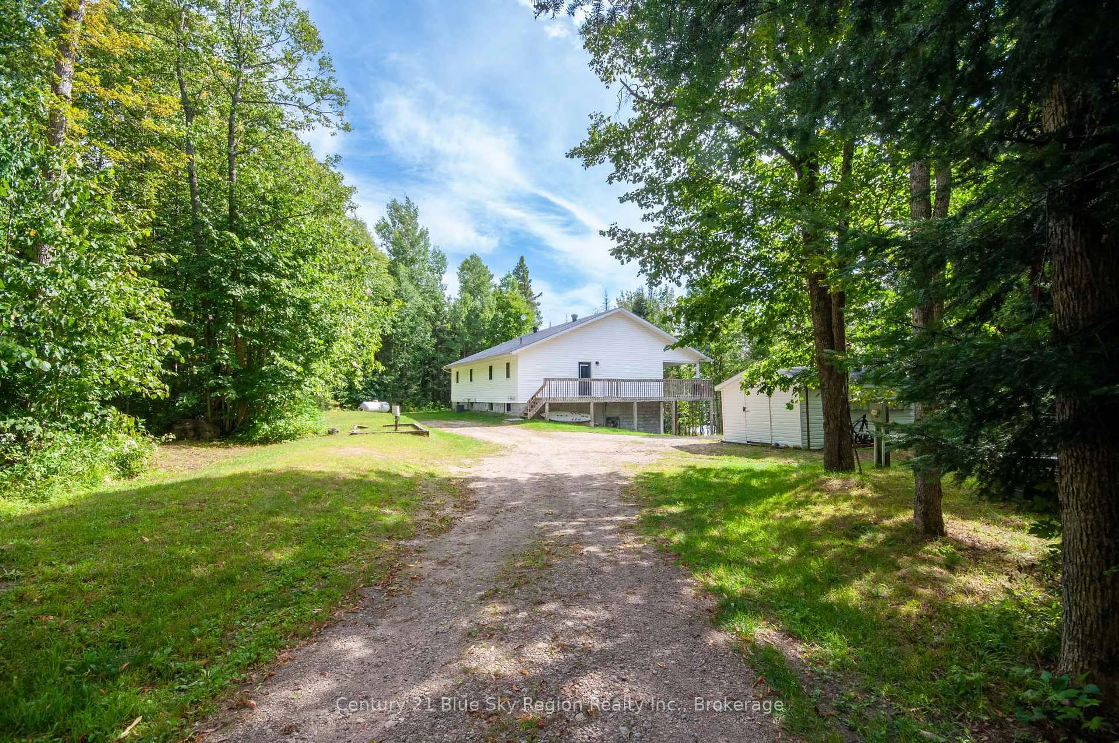 A pic from outside/outdoor area/front of a property/back of a property/a pic from drone, forest/trees view for 501 Golf Course Rd, Chisholm Ontario P0H 1Z0