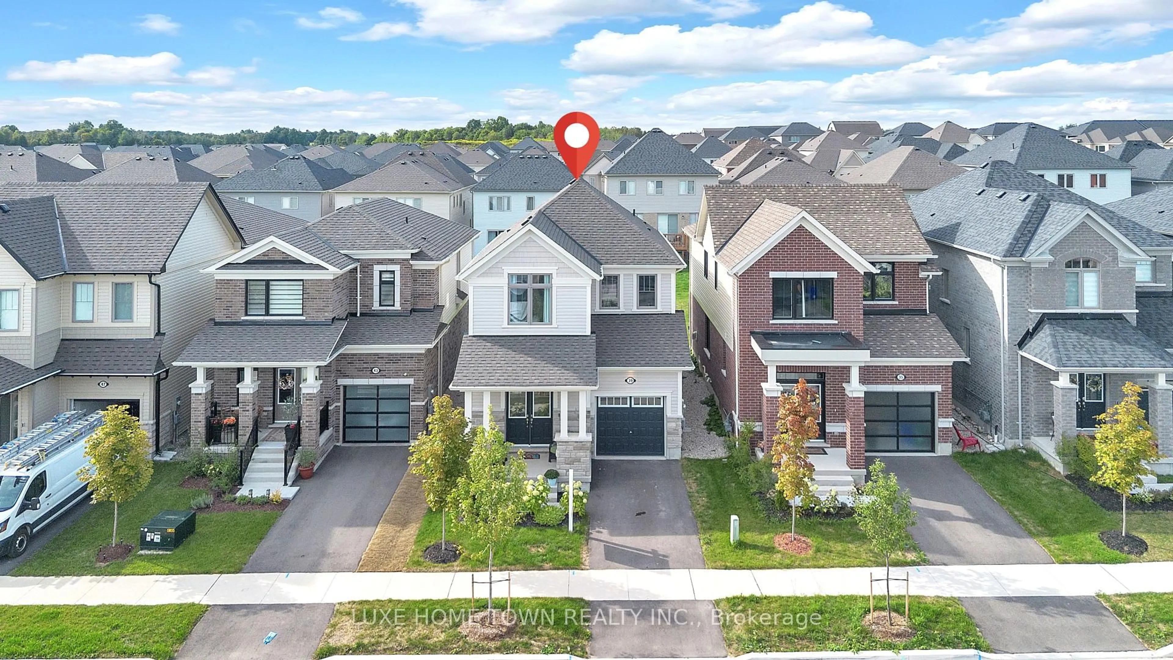 A pic from outside/outdoor area/front of a property/back of a property/a pic from drone, street for 39 Spicer St, Centre Wellington Ontario N1M 0H7