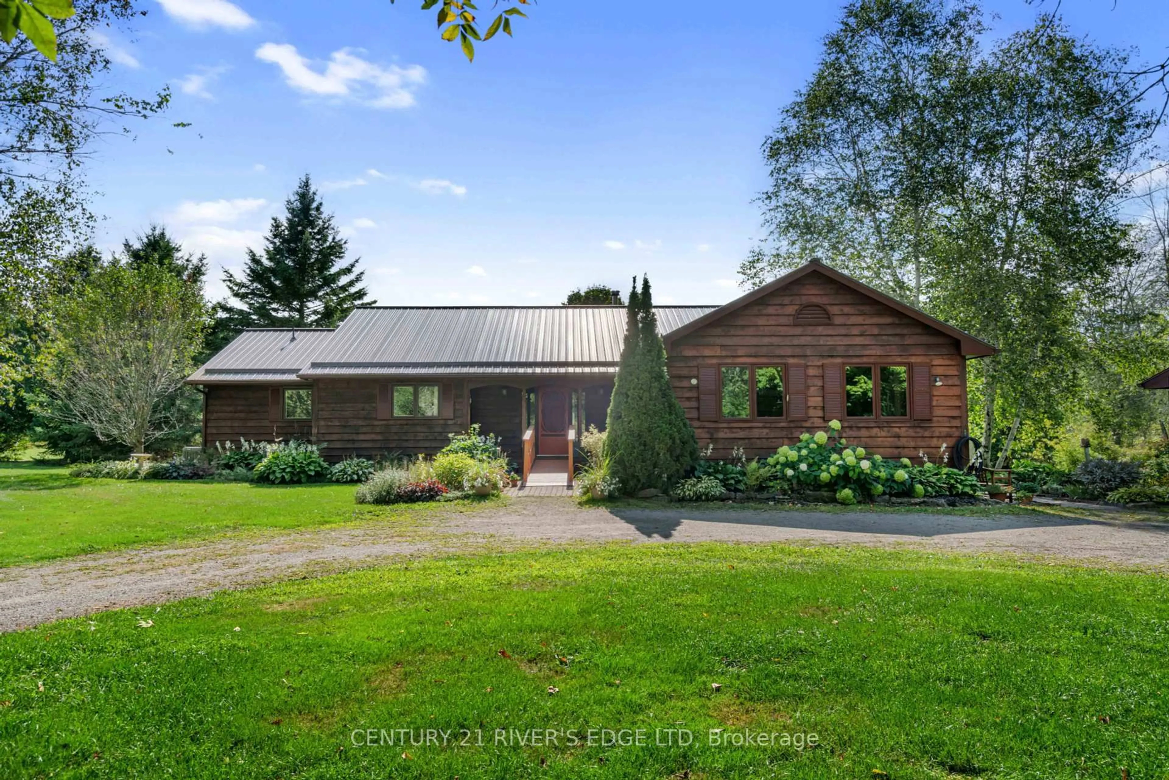 A pic from outside/outdoor area/front of a property/back of a property/a pic from drone, unknown for 814 Plumhollow Rd, Rideau Lakes Ontario K0E 1B0
