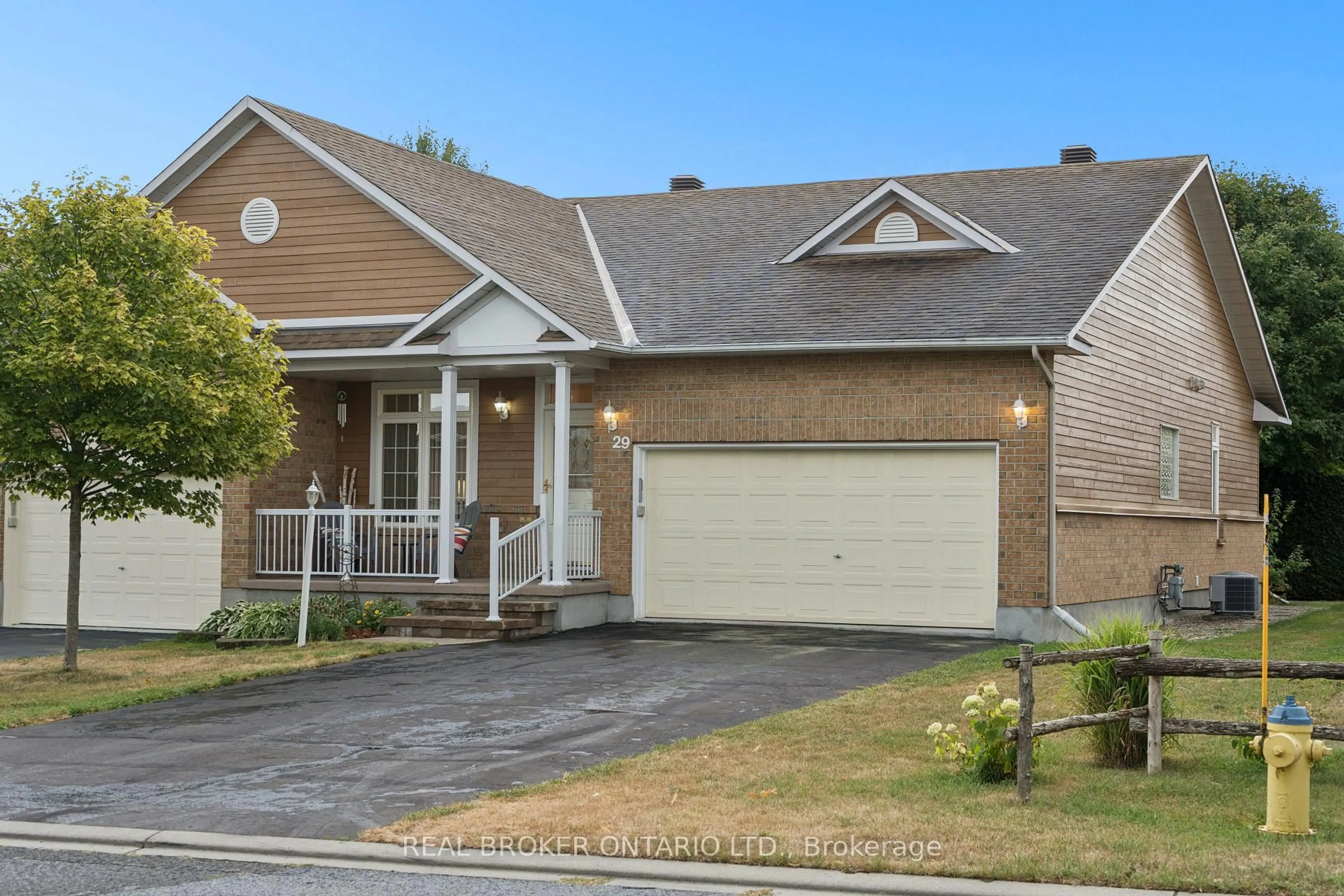 Home with brick exterior material, street for 29 Sable Run Dr, Stittsville Ontario K2S 1W8