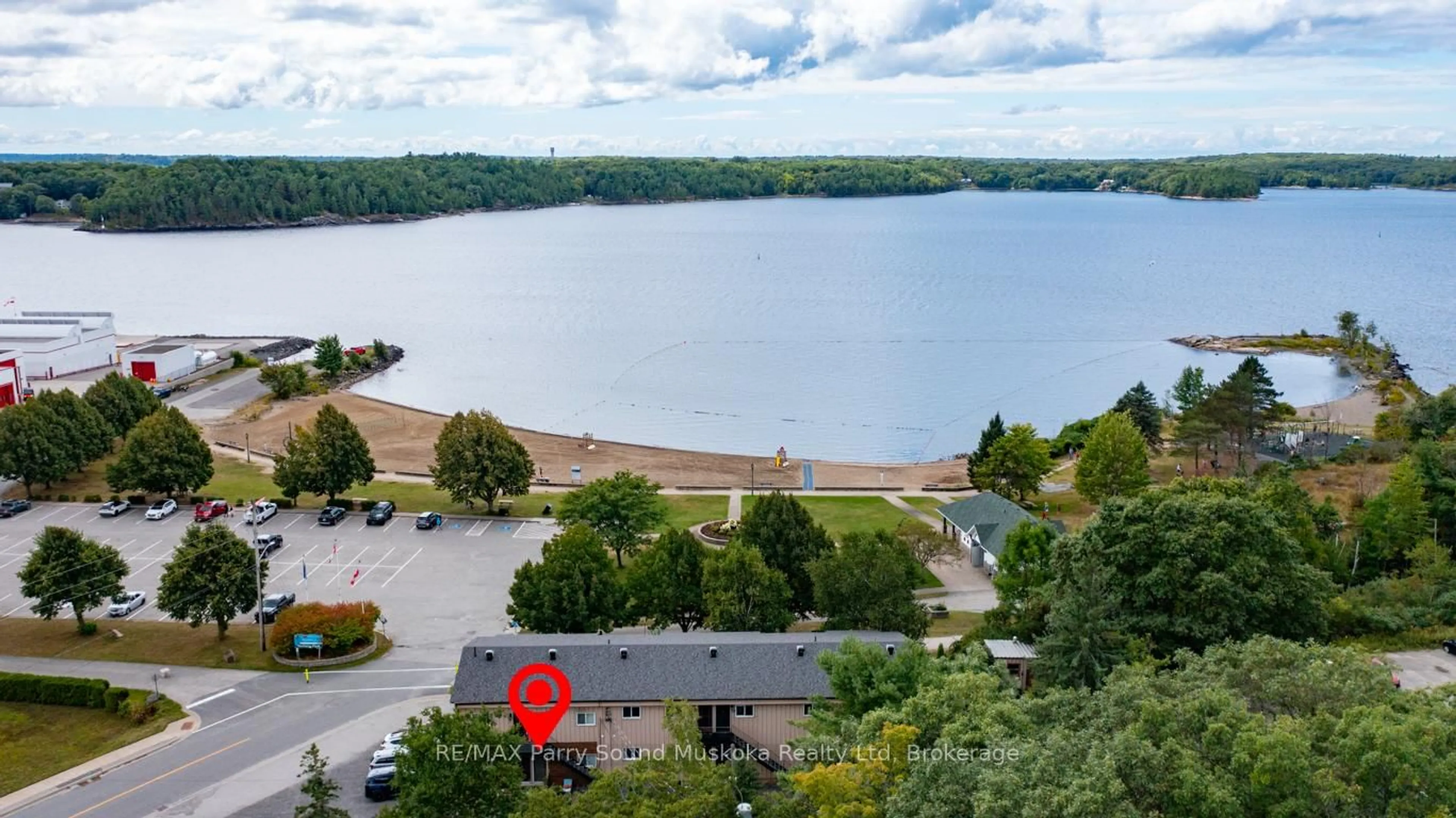 A pic from outside/outdoor area/front of a property/back of a property/a pic from drone, water/lake/river/ocean view for 21 Prospect St #4, Parry Sound Ontario P2A 2B5