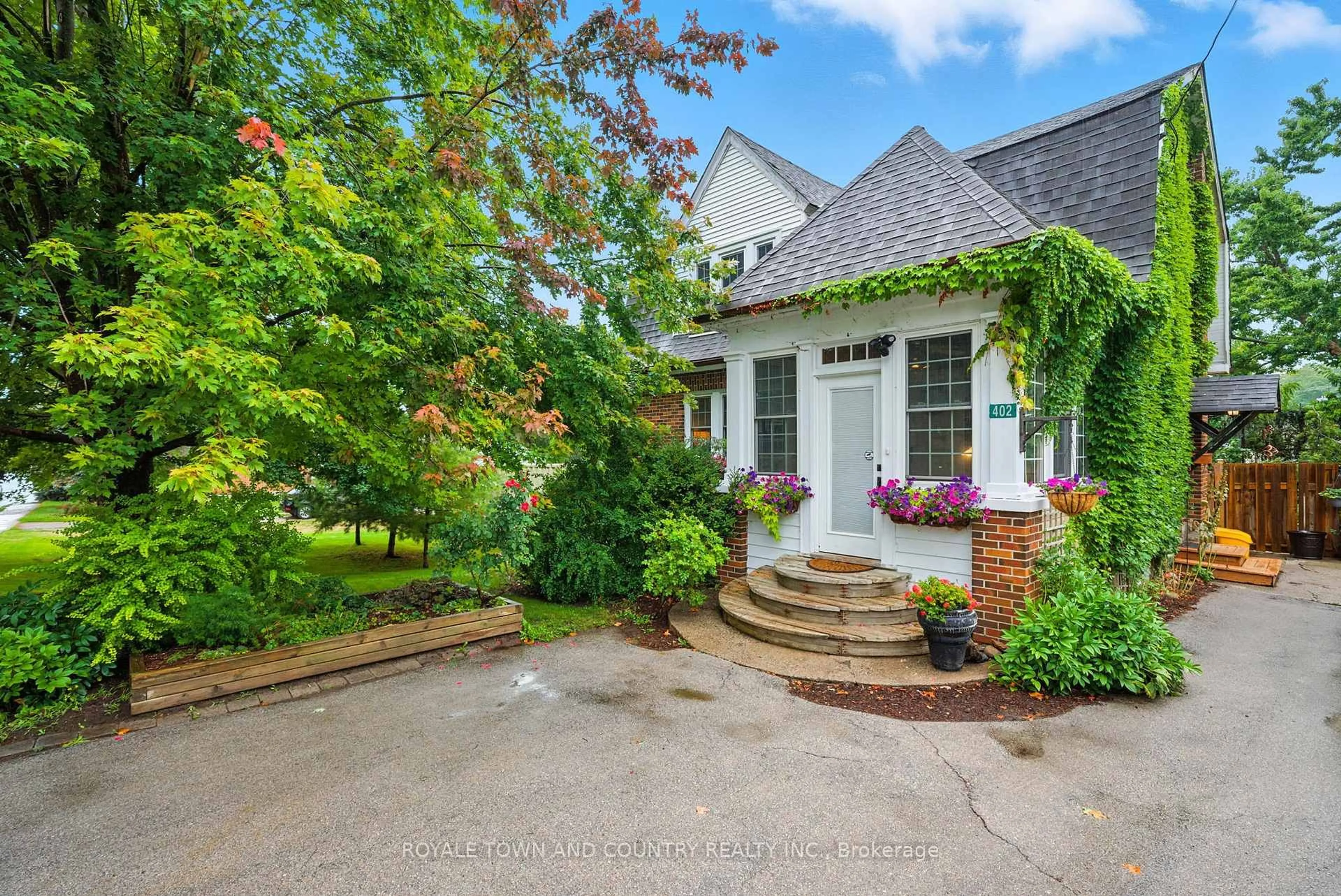 Home with brick exterior material, street for 402 Eldon Rd, Kawartha Lakes Ontario K0M 2C0
