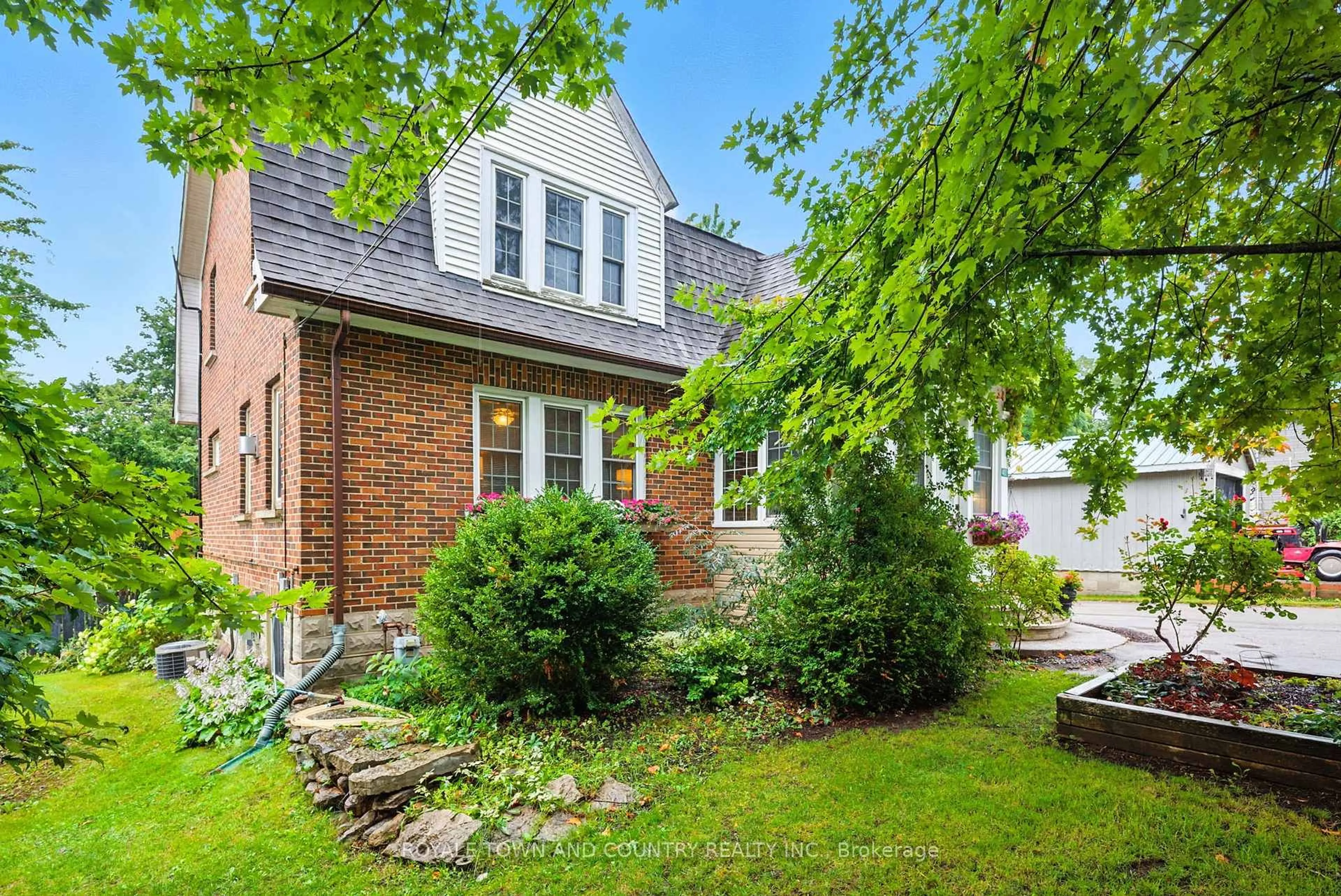 Home with brick exterior material, street for 402 Eldon Rd, Kawartha Lakes Ontario K0M 2C0