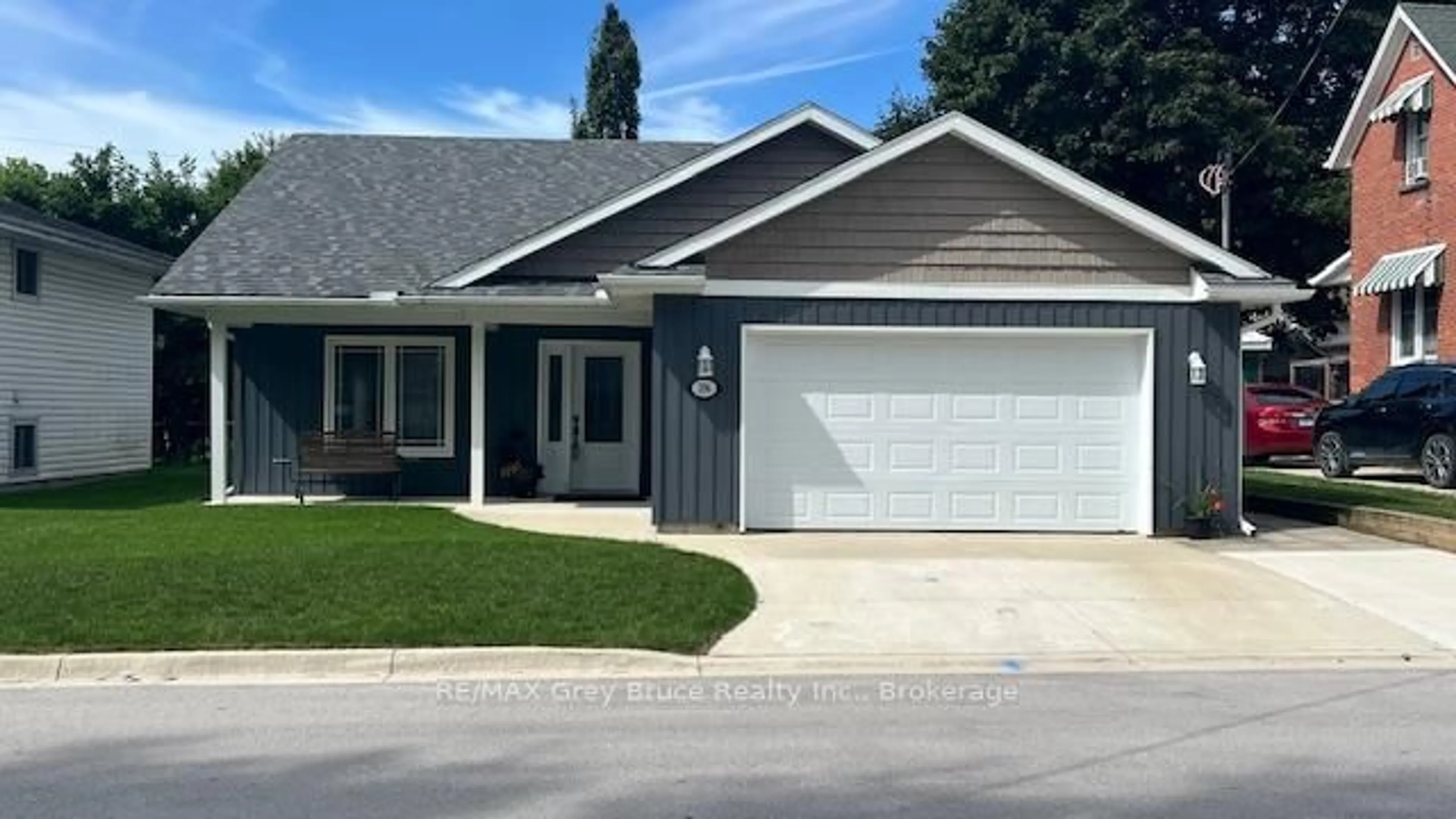 Home with vinyl exterior material, street for 206 4th Ave, Arran-Elderslie Ontario N0G 1L0