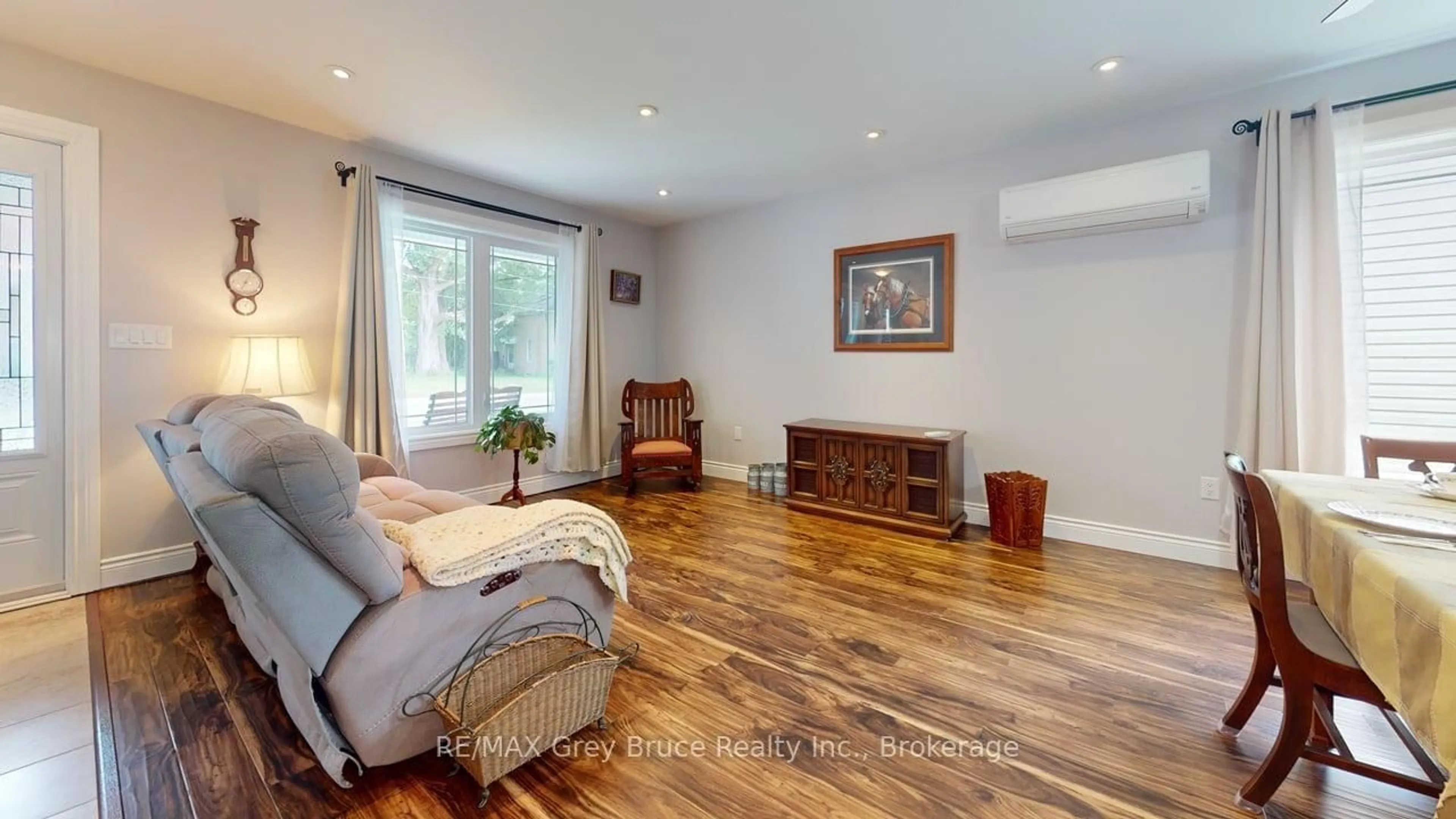 Living room with furniture, wood/laminate floor for 206 4th Ave, Arran-Elderslie Ontario N0G 1L0