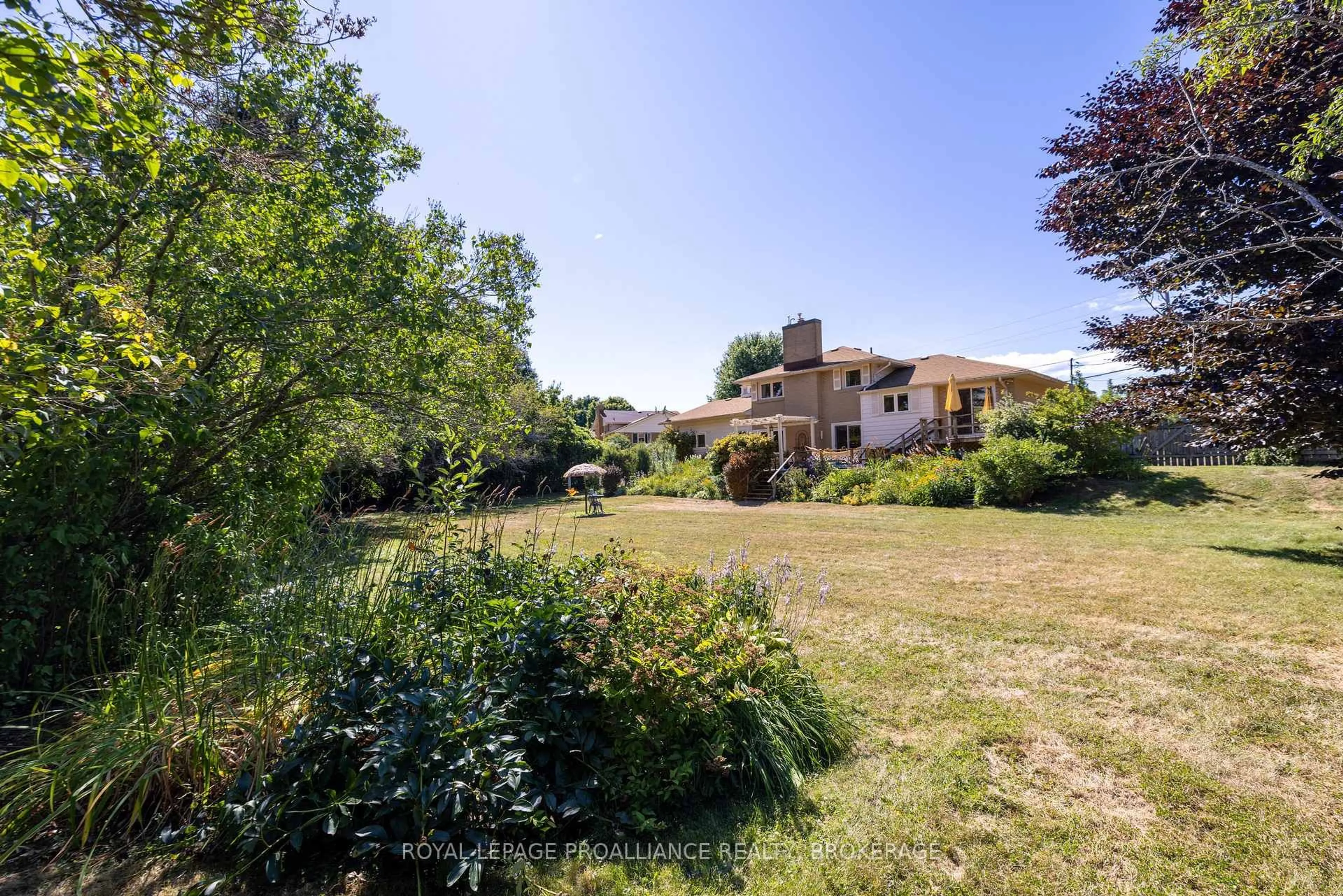 A pic from outside/outdoor area/front of a property/back of a property/a pic from drone, street for 35 Manitou Cres, Loyalist Ontario K7N 1B1