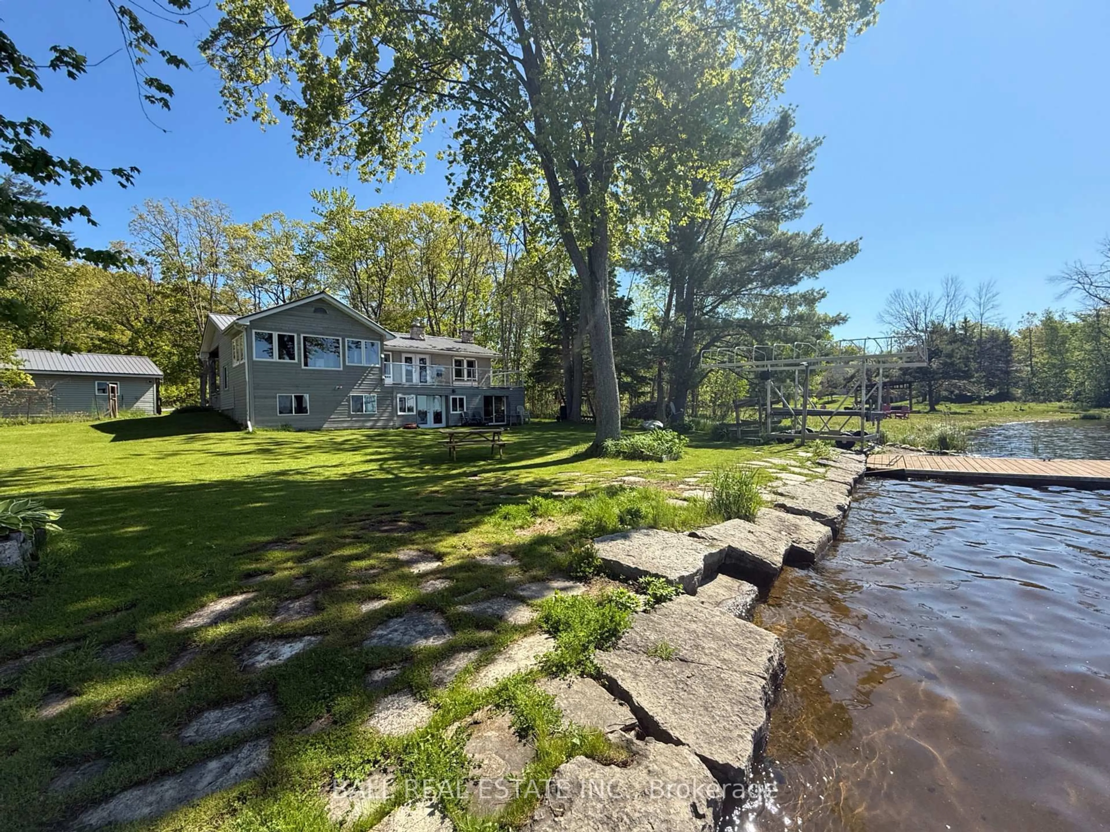 A pic from outside/outdoor area/front of a property/back of a property/a pic from drone, water/lake/river/ocean view for 79 Hulls Rd, North Kawartha Ontario K0L 2H0