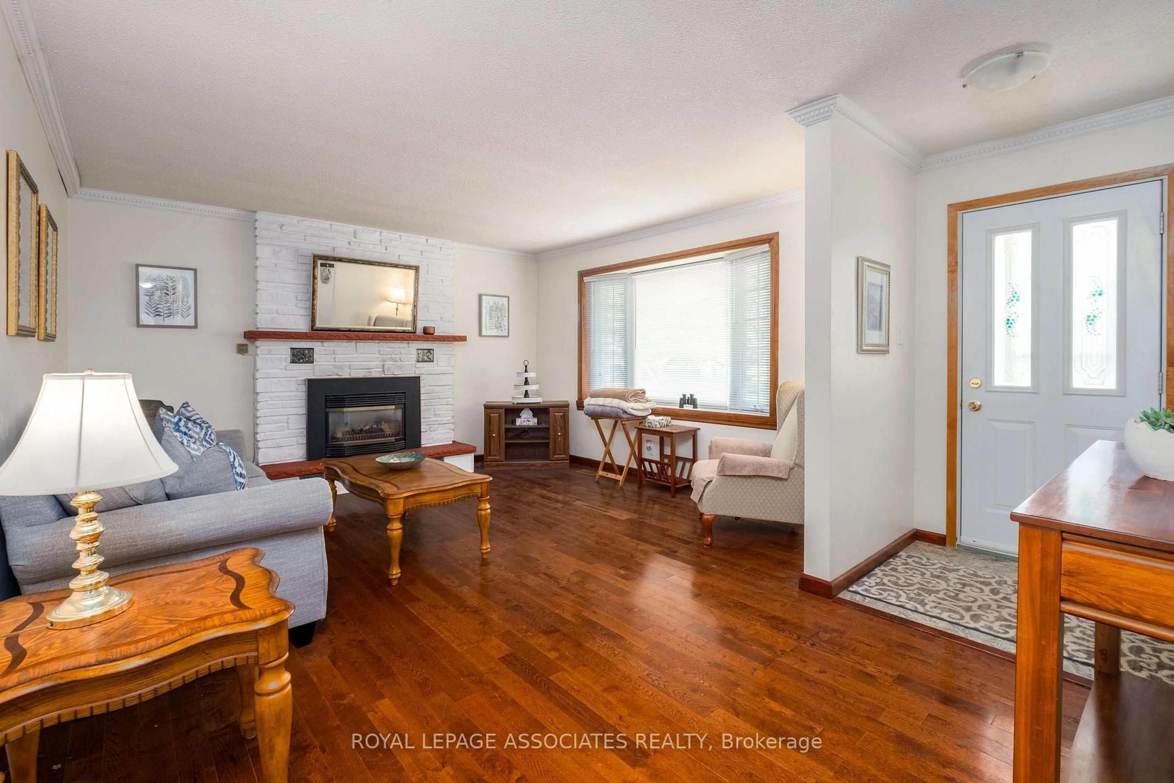 Living room with furniture, wood/laminate floor for 4146 County Rd 30, Trent Hills Ontario K0K 3K0