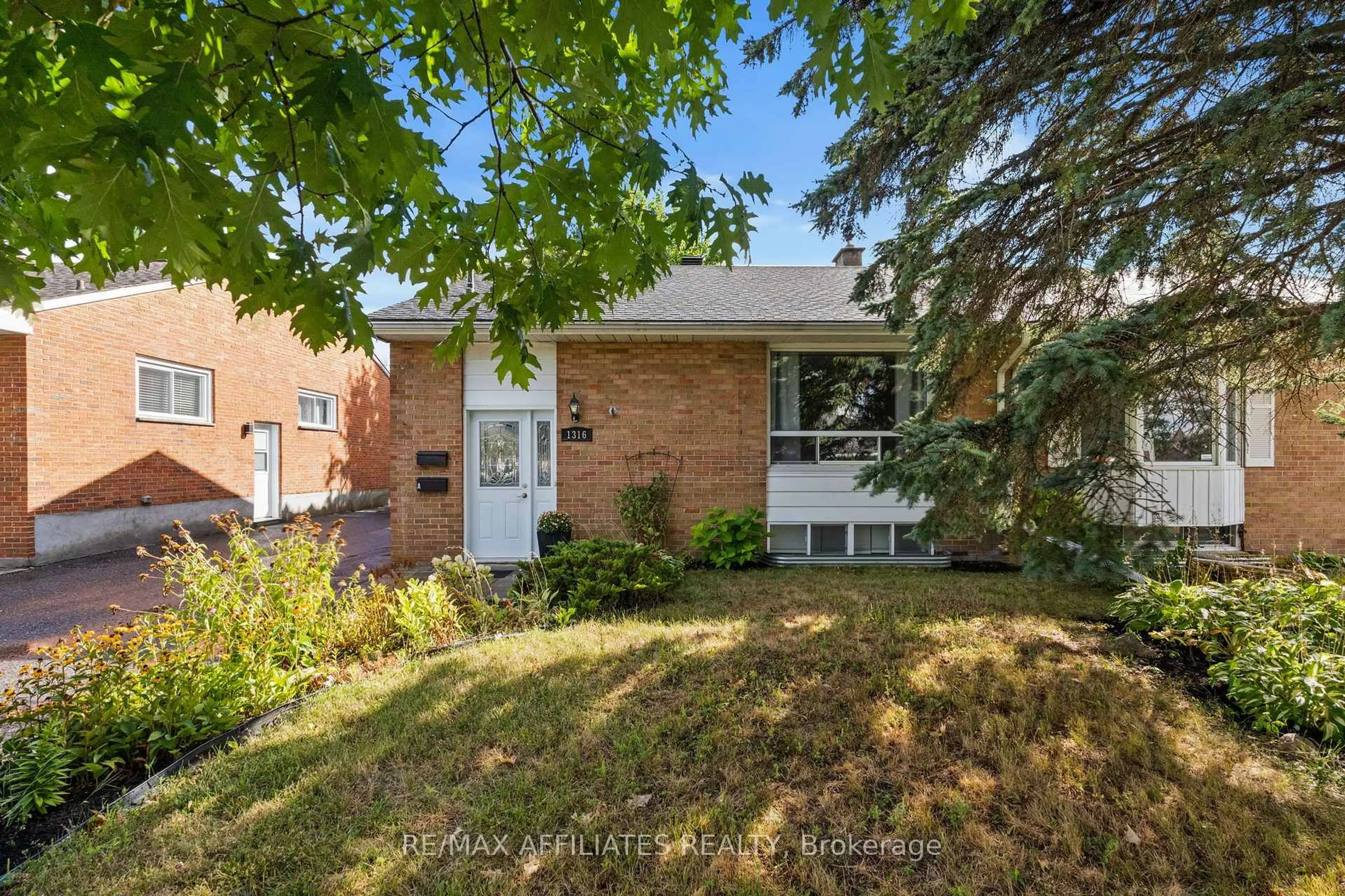 Home with brick exterior material, street for 1316 Bloomsbury Cres, Ottawa Ontario K2C 2Y9