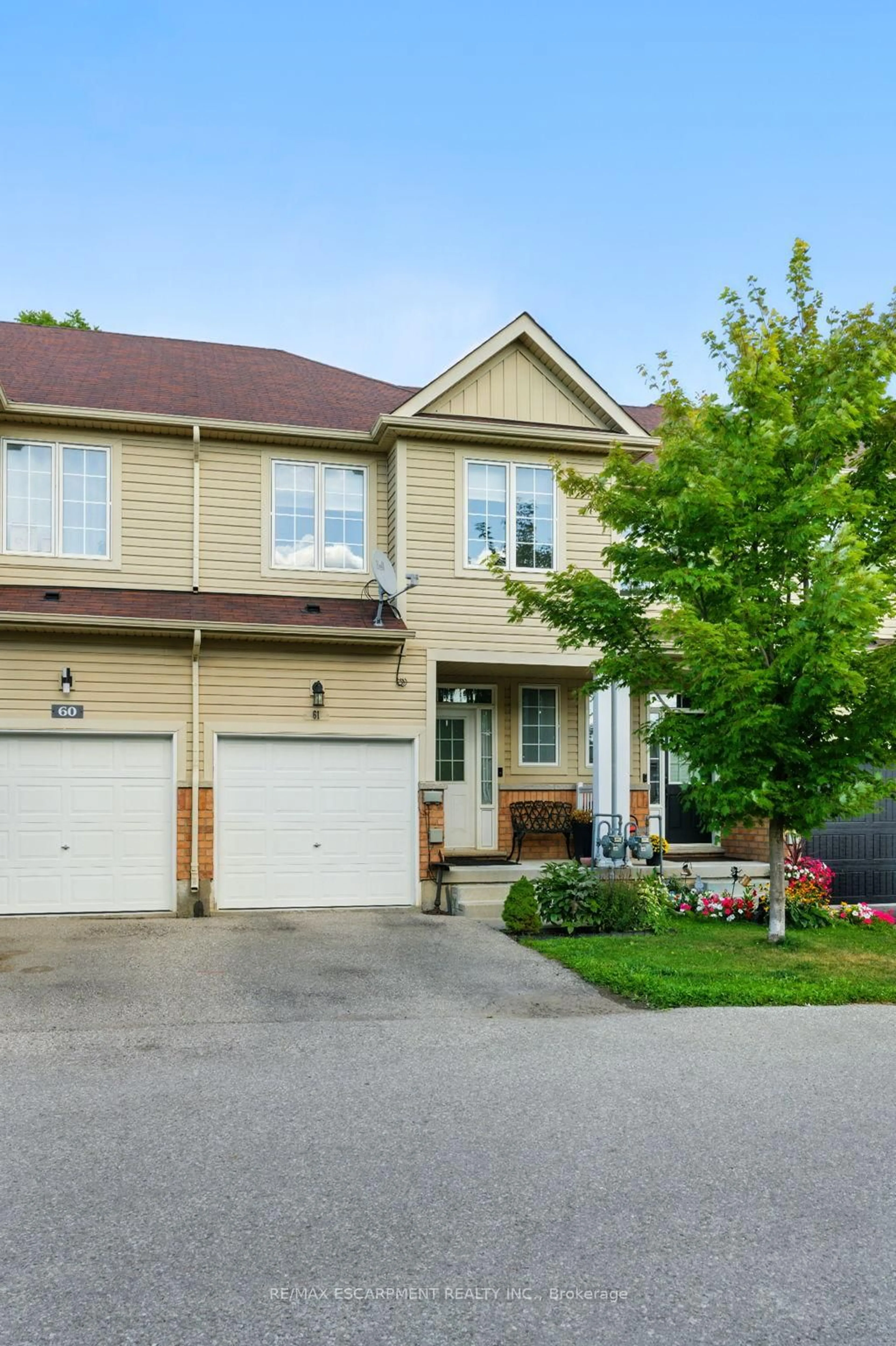 Home with brick exterior material, street for 21 Diana Ave #61, Brantford Ontario N3T 0G7
