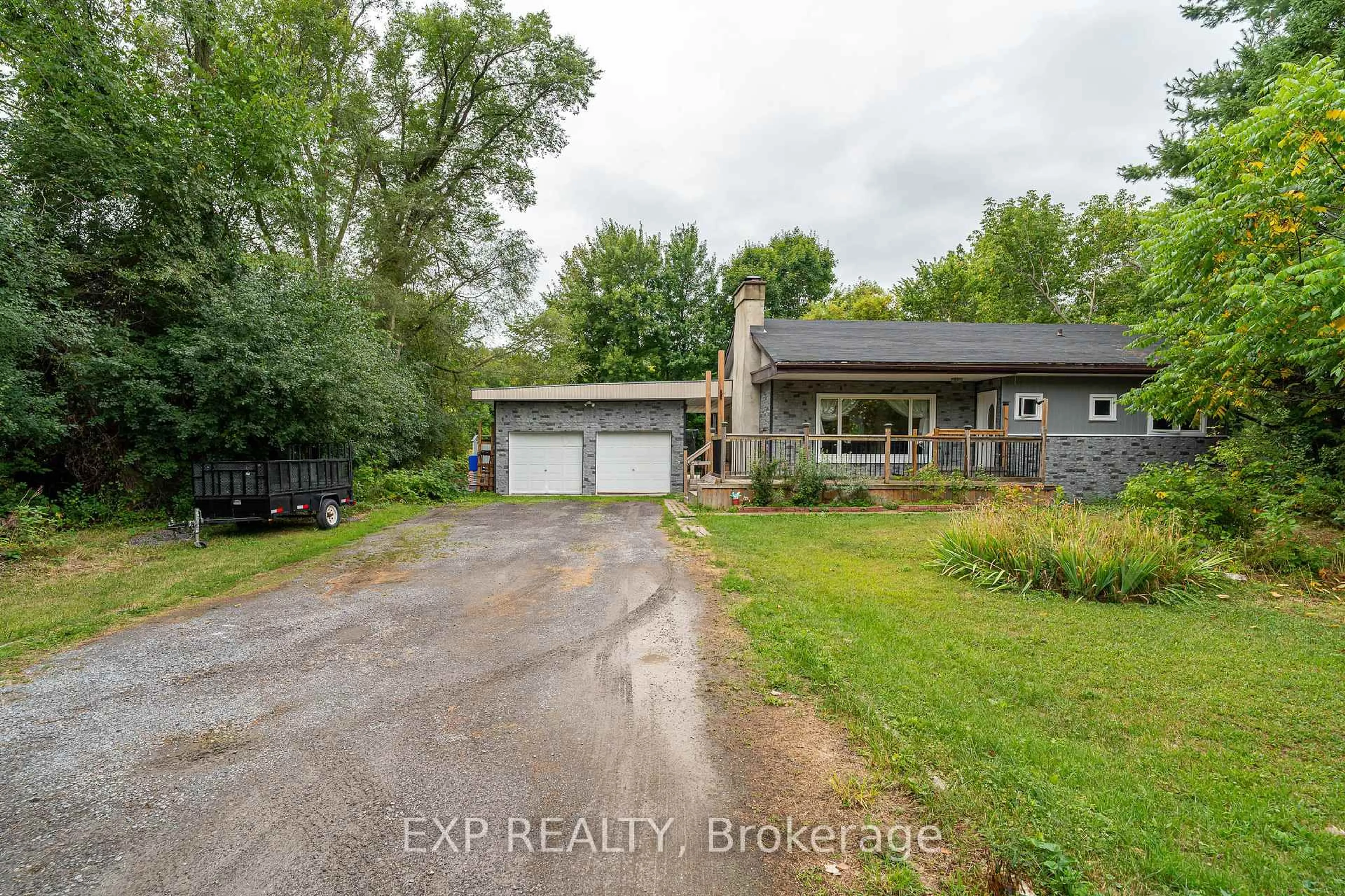 A pic from outside/outdoor area/front of a property/back of a property/a pic from drone, water/lake/river/ocean view for 1807 Second Line Rd, Ottawa Ontario K2K 1X7