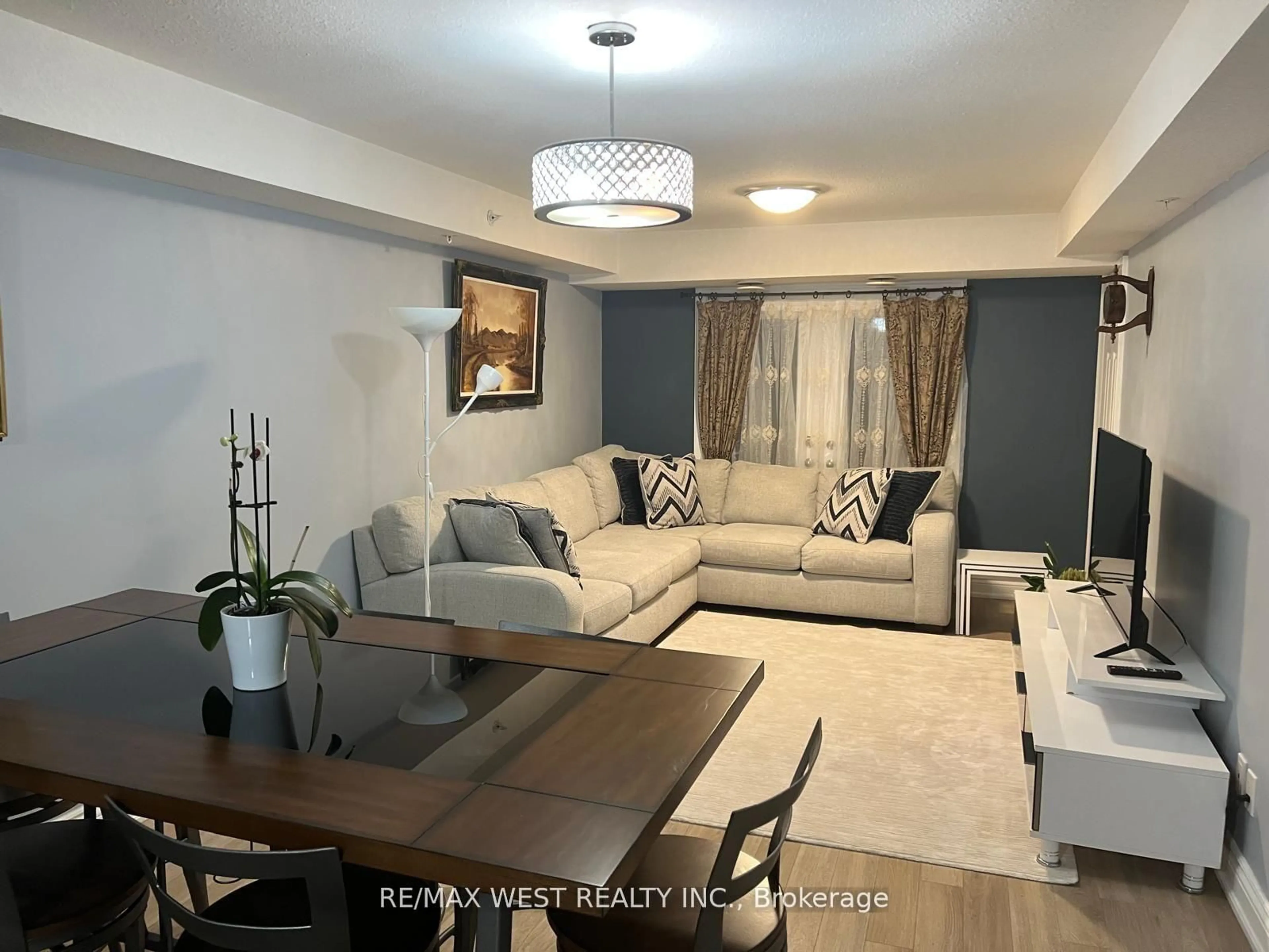 Living room with furniture, unknown for 64 Frederick Dr #401, Guelph Ontario N1L 0E9