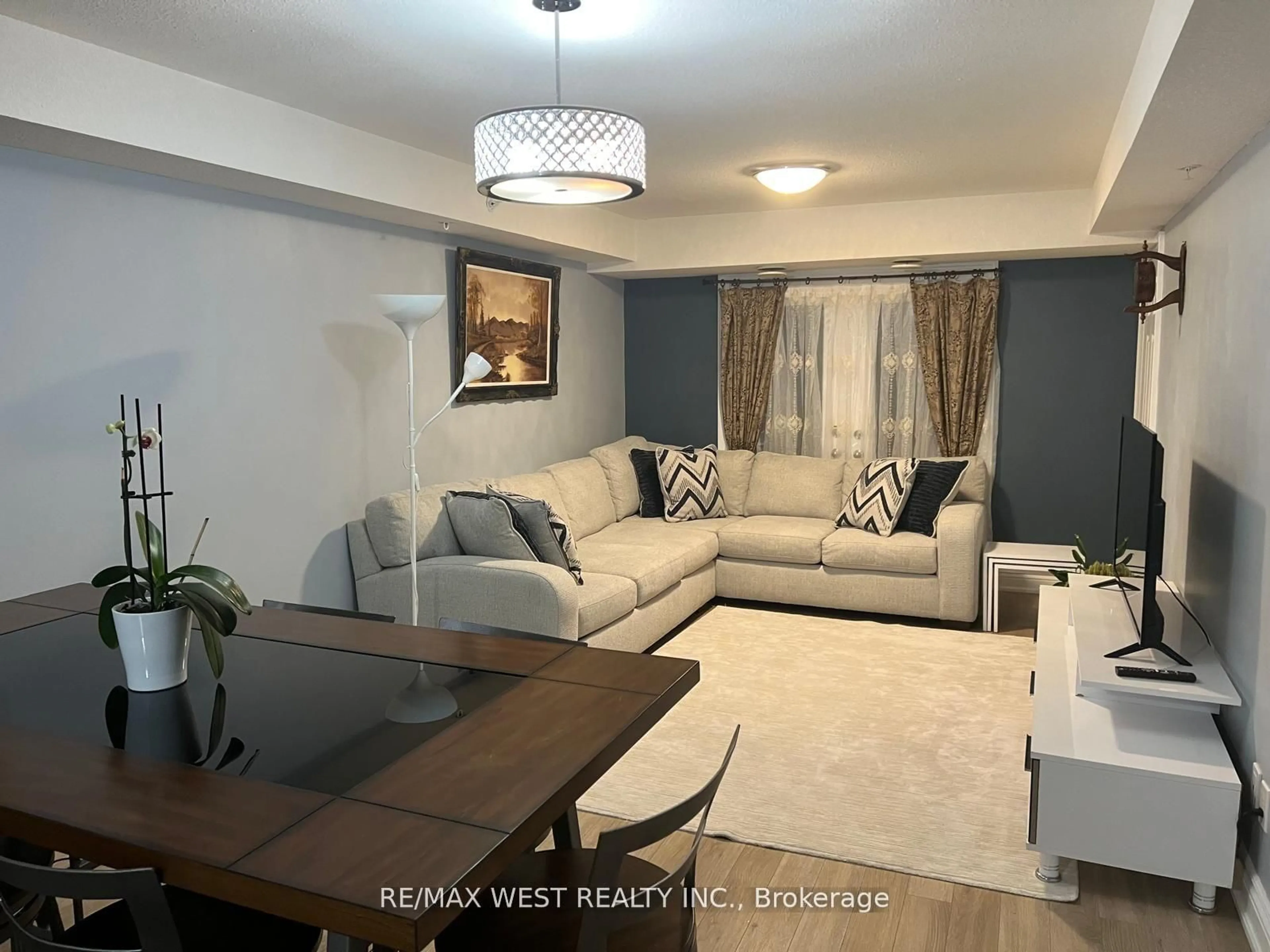 Living room with furniture, unknown for 64 Frederick Dr #401, Guelph Ontario N1L 0E9