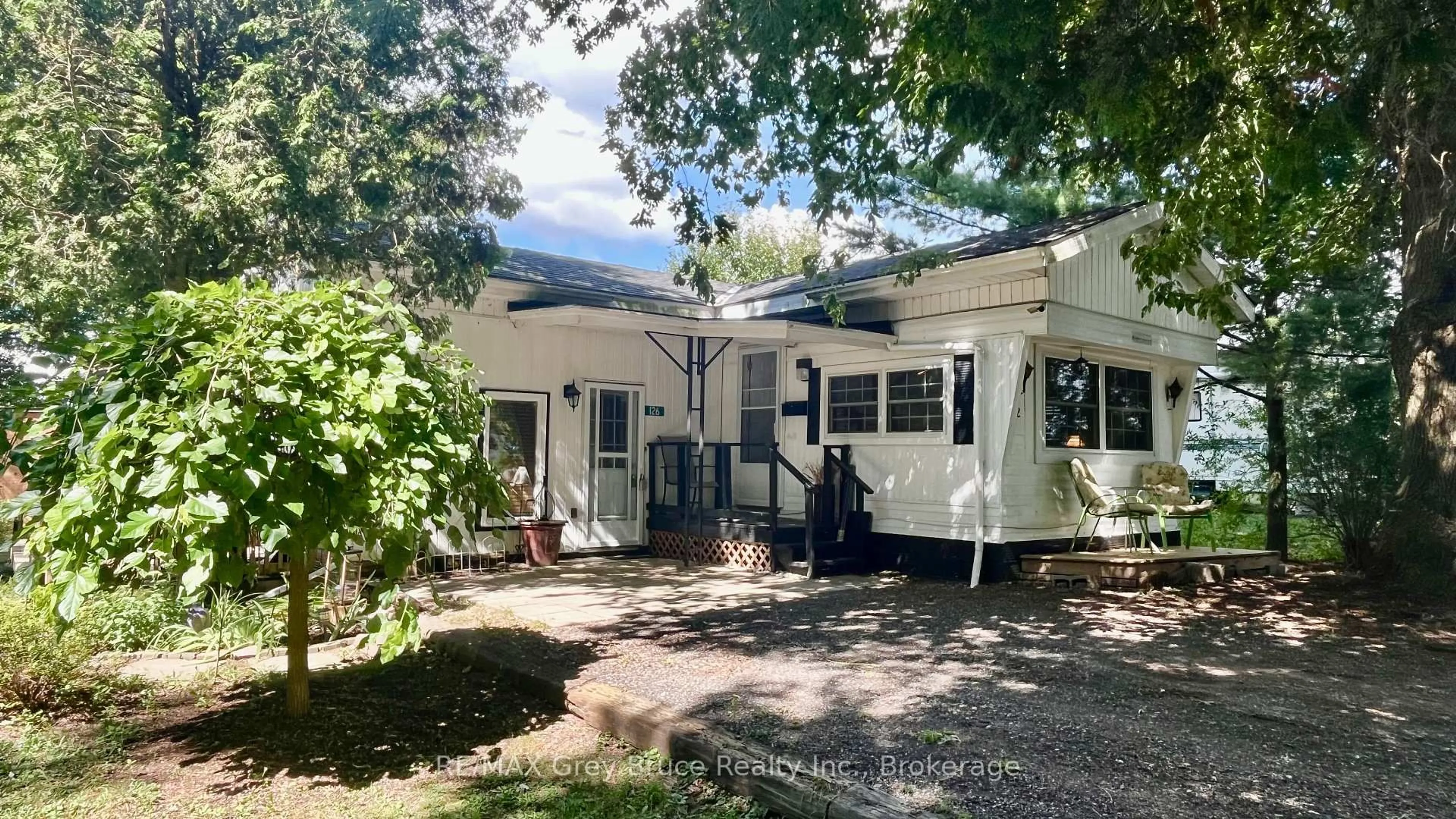 A pic from outside/outdoor area/front of a property/back of a property/a pic from drone, mountain view for 126 Harvey St, Georgian Bluffs Ontario N0H 2N0
