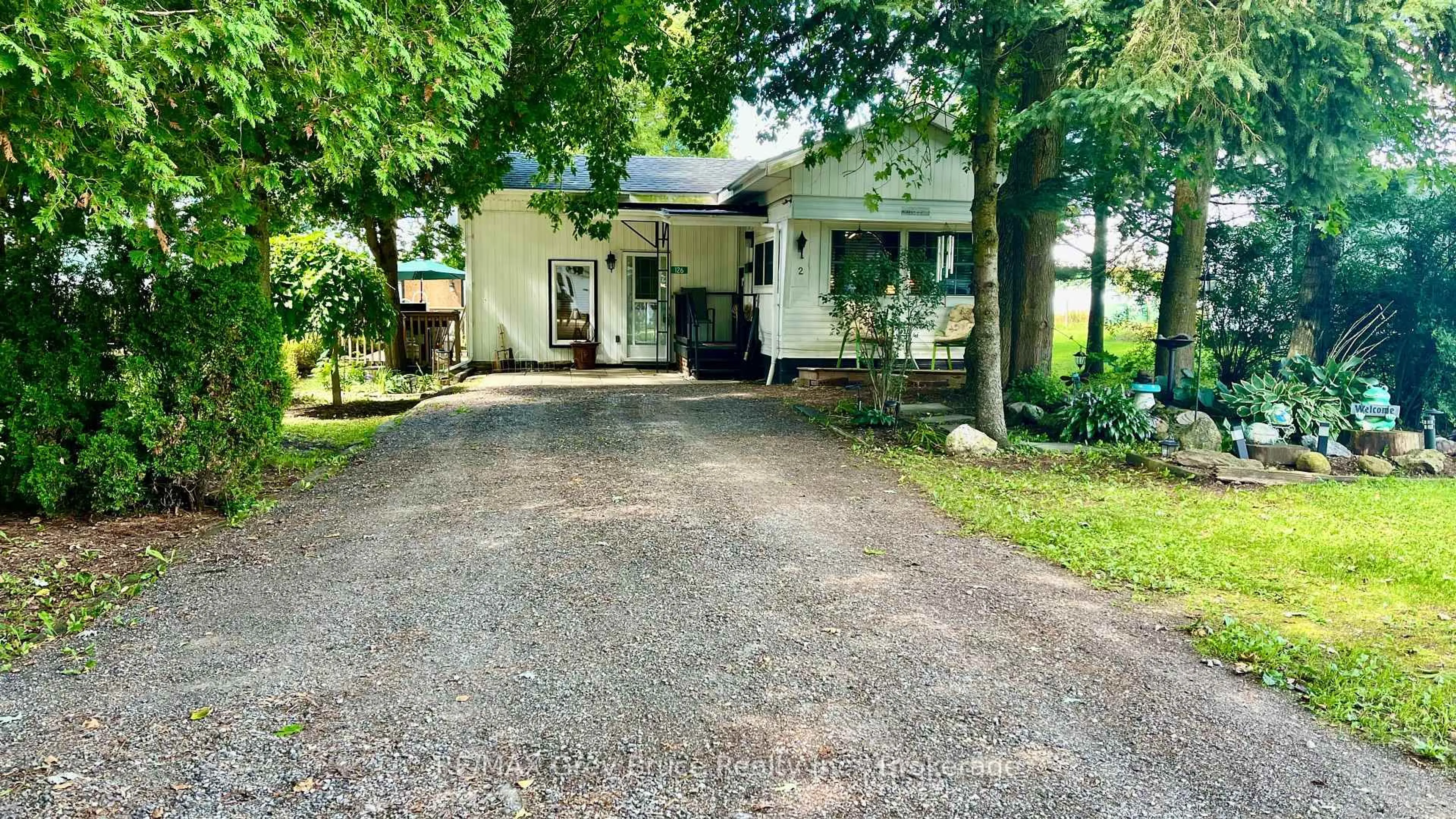 A pic from outside/outdoor area/front of a property/back of a property/a pic from drone, street for 126 Harvey St, Georgian Bluffs Ontario N0H 2N0