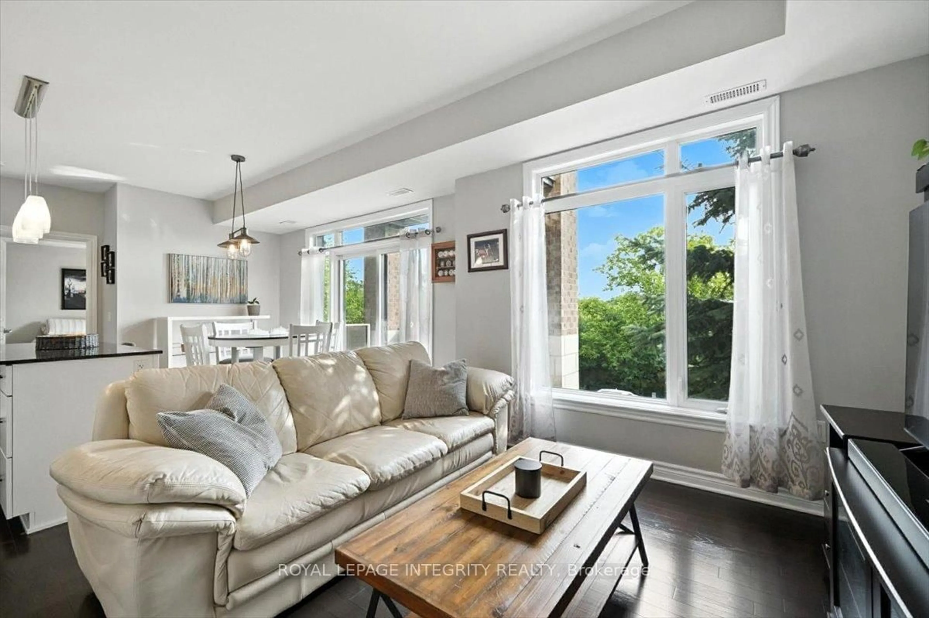 Living room with furniture, unknown for 755 Beauparc Private #202, Ottawa Ontario K1J 0A2