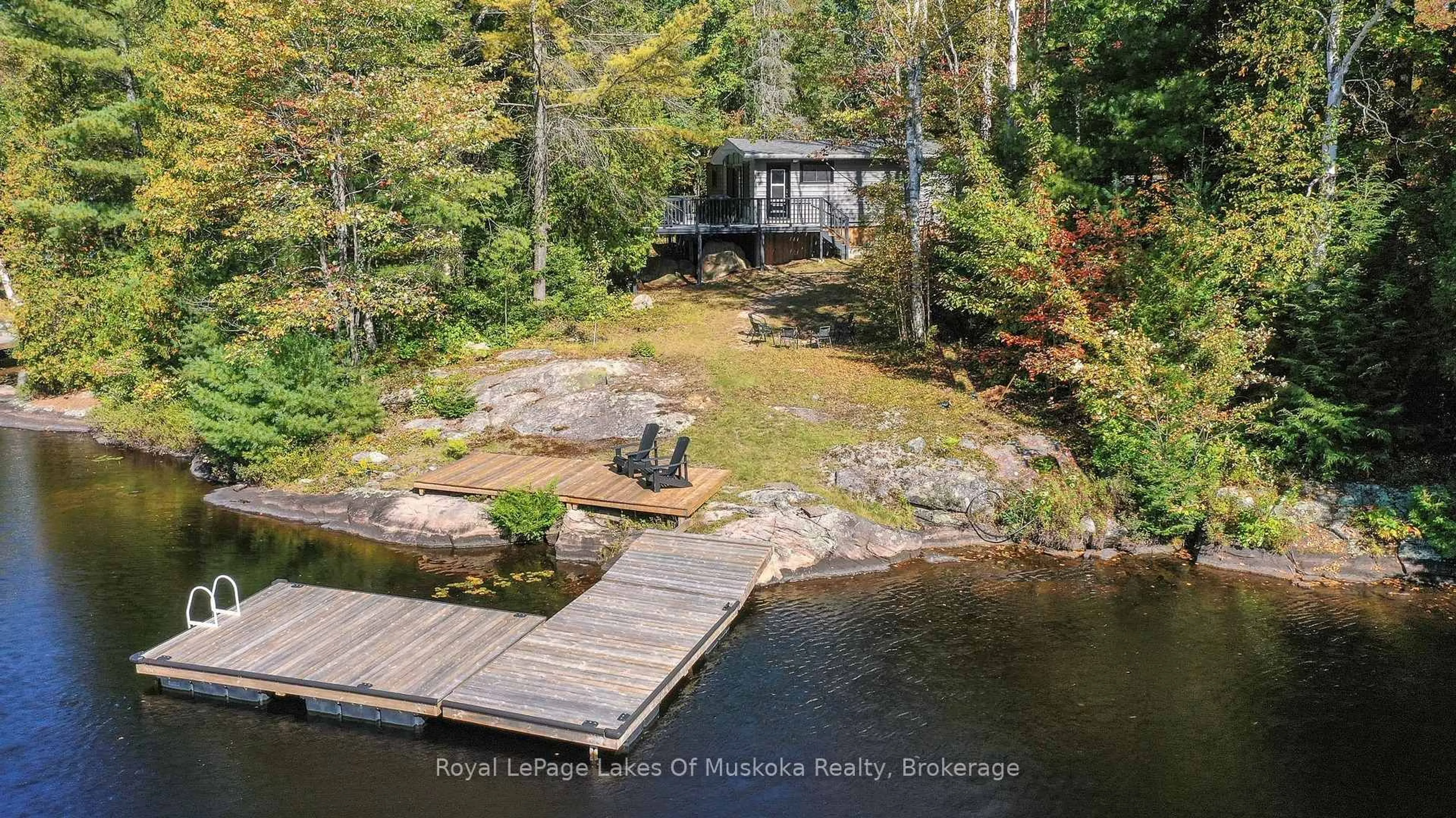 A pic from outside/outdoor area/front of a property/back of a property/a pic from drone, water/lake/river/ocean view for 1307 Dickie Lake Rd, Lake of Bays Ontario P0B 1A0