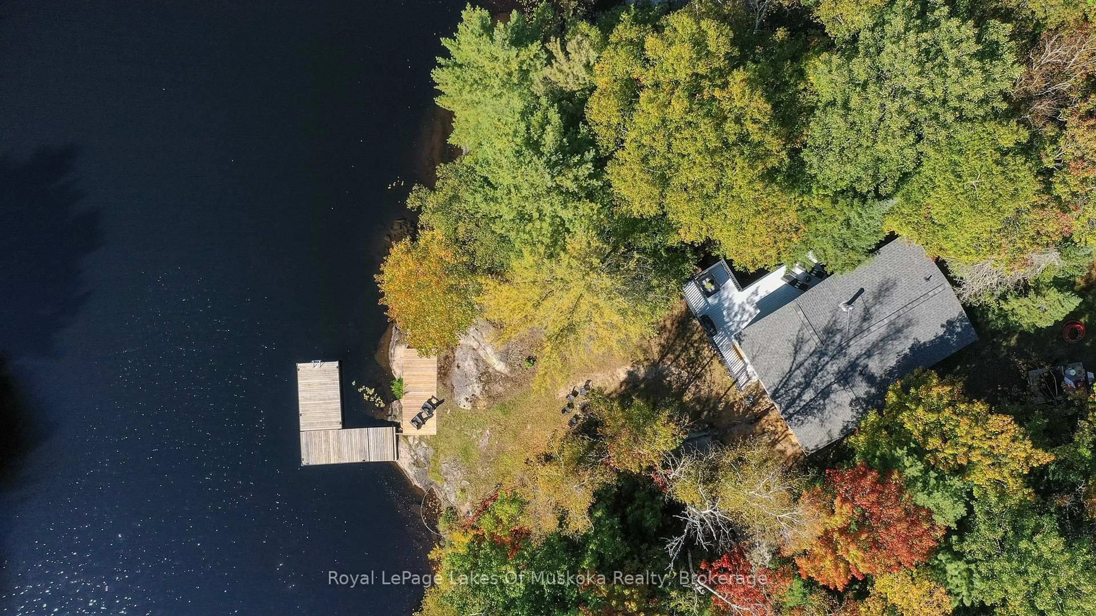 A pic from outside/outdoor area/front of a property/back of a property/a pic from drone, water/lake/river/ocean view for 1307 Dickie Lake Rd, Lake of Bays Ontario P0B 1A0