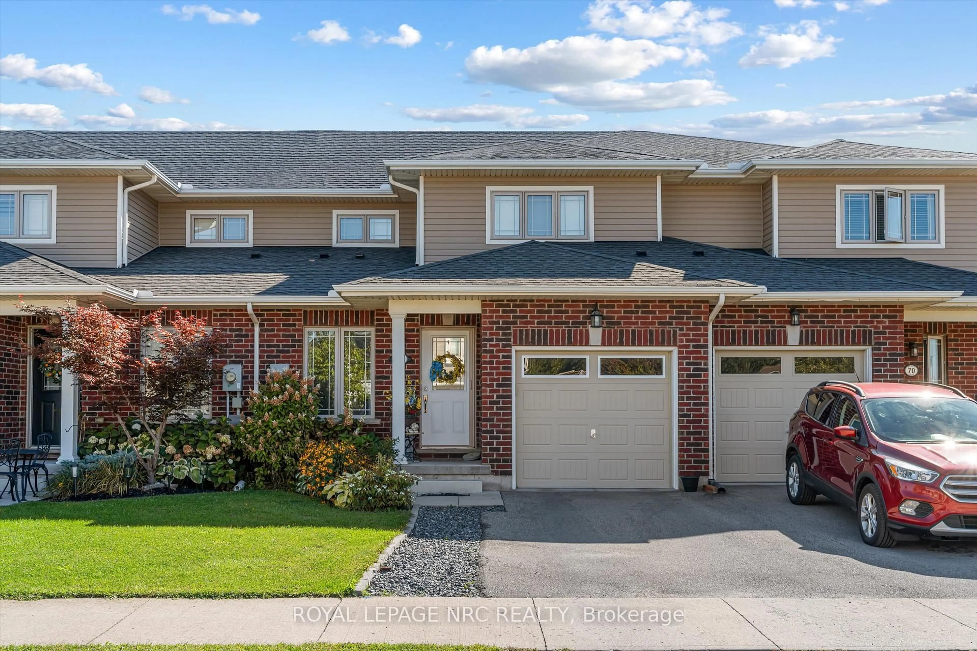 Home with brick exterior material, street for 66 Oliver Lane, St. Catharines Ontario L2P 0E4