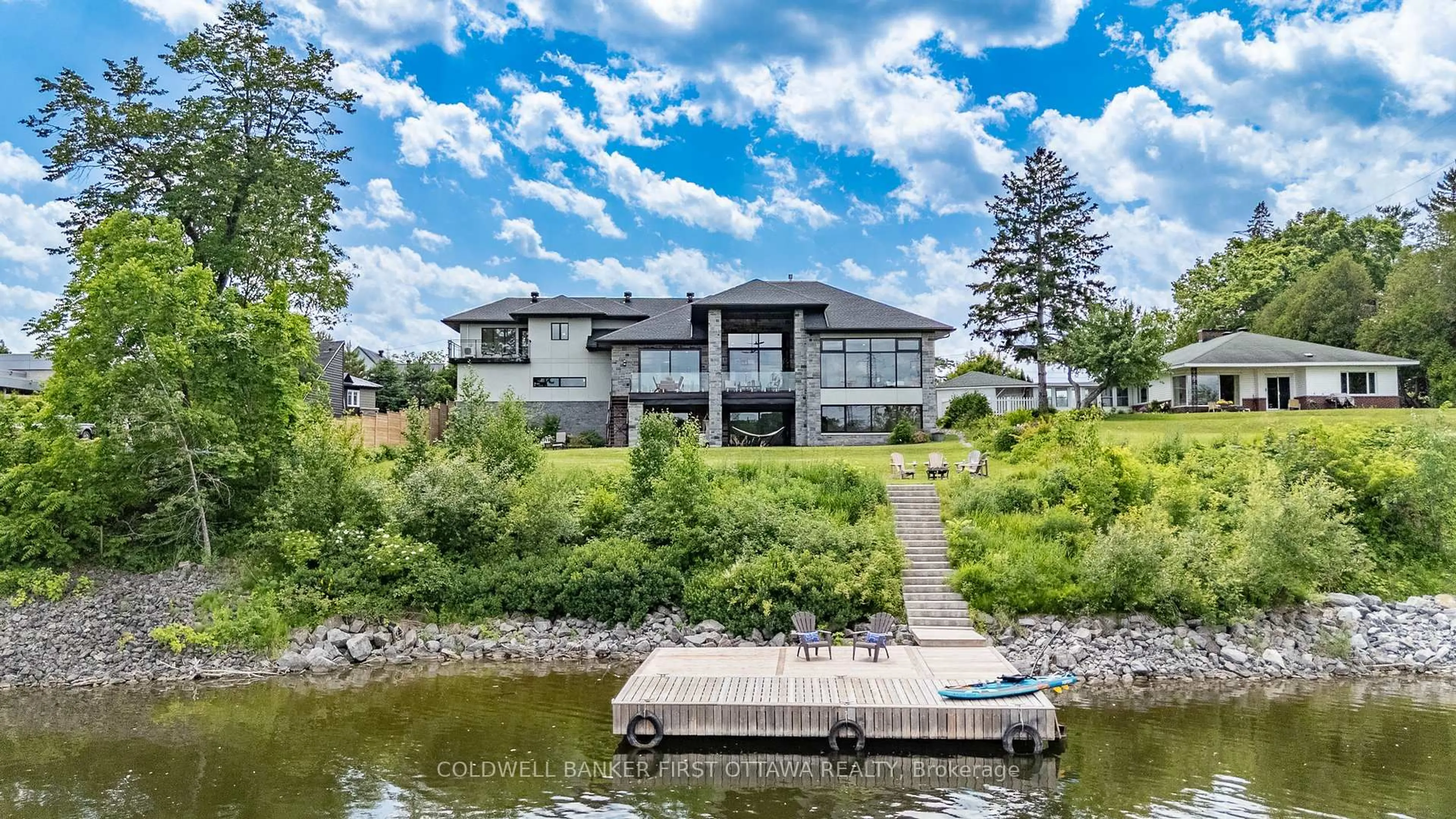 A pic from outside/outdoor area/front of a property/back of a property/a pic from drone, water/lake/river/ocean view for 1981 Prince of Wales Dr, Ottawa Ontario K2C 3J7