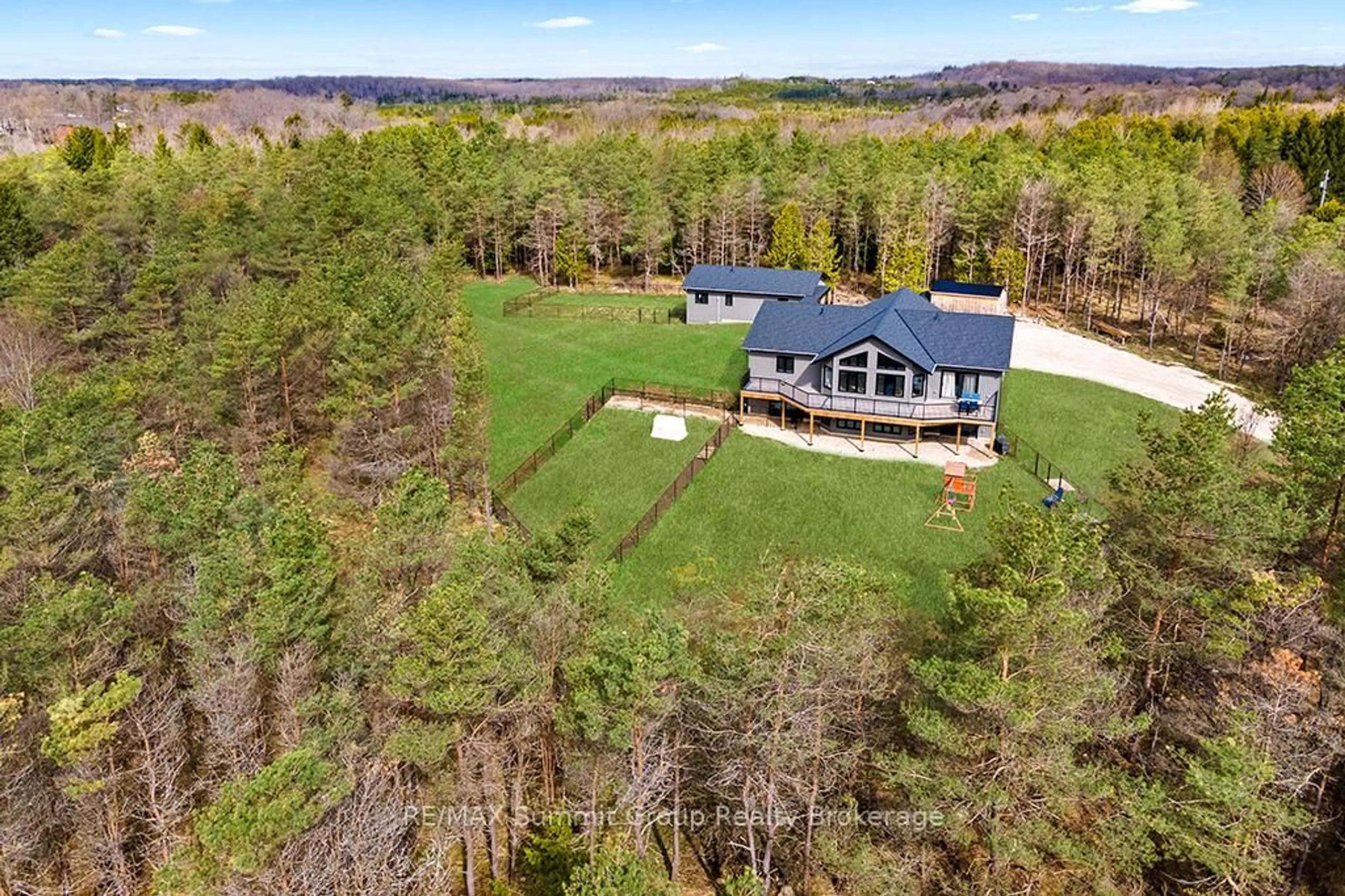 A pic from outside/outdoor area/front of a property/back of a property/a pic from drone, water/lake/river/ocean view for 615690 Hamilton Lane, West Grey Ontario N0C 1H0