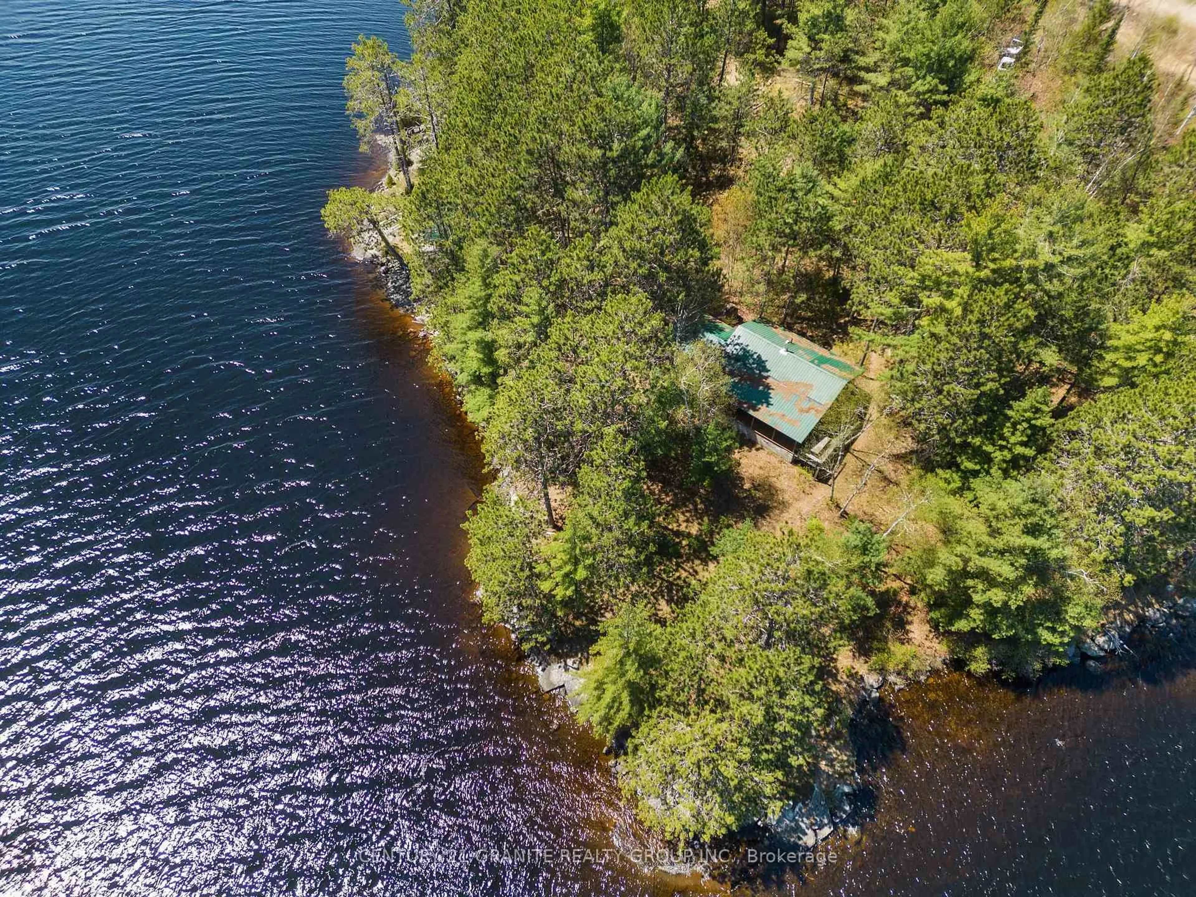 A pic from outside/outdoor area/front of a property/back of a property/a pic from drone, water/lake/river/ocean view for 39 Windmill Point Lane, South Algonquin Ontario K0J 2M0