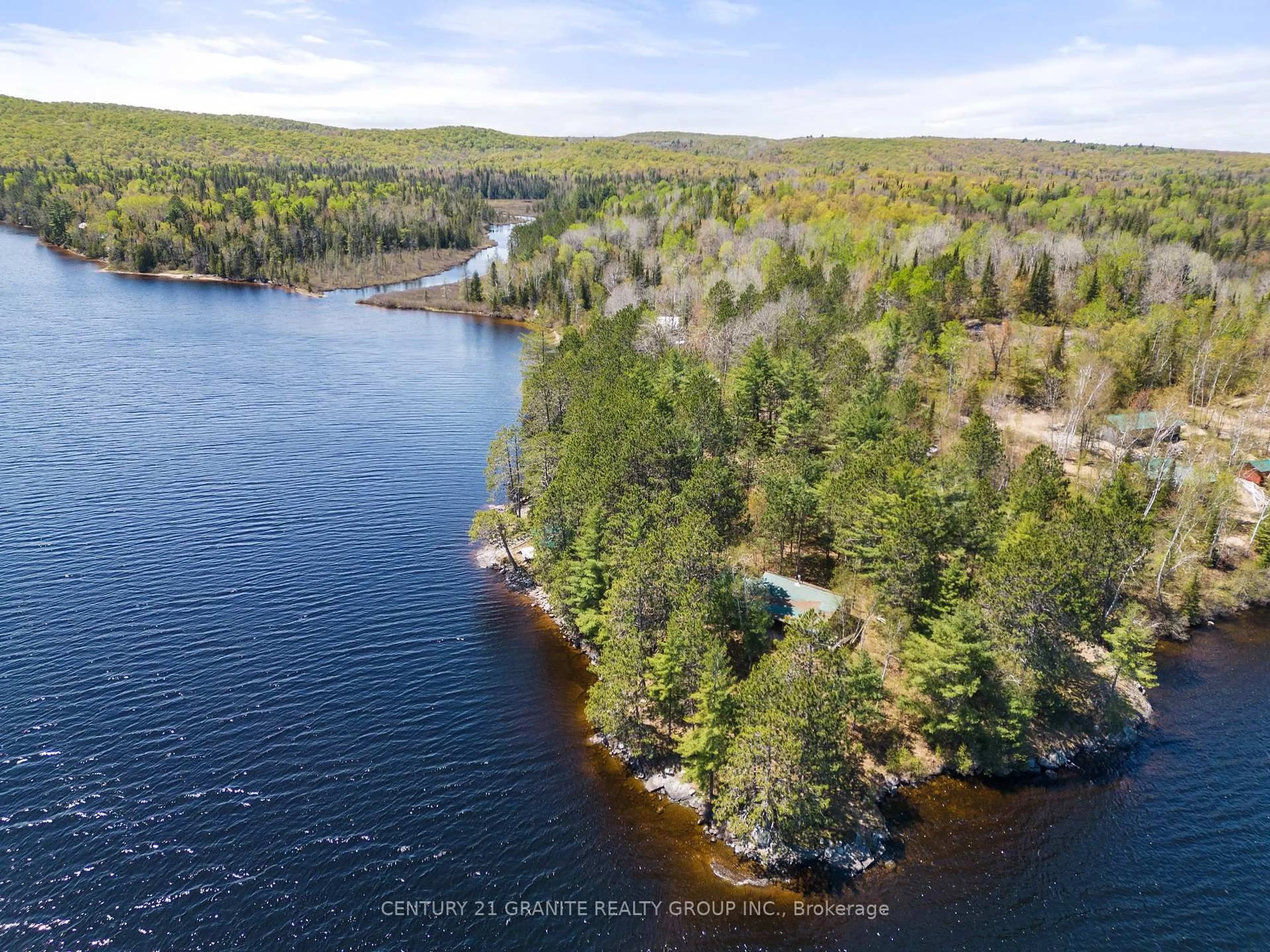 A pic from outside/outdoor area/front of a property/back of a property/a pic from drone, water/lake/river/ocean view for 39 Windmill Point Lane, South Algonquin Ontario K0J 2M0