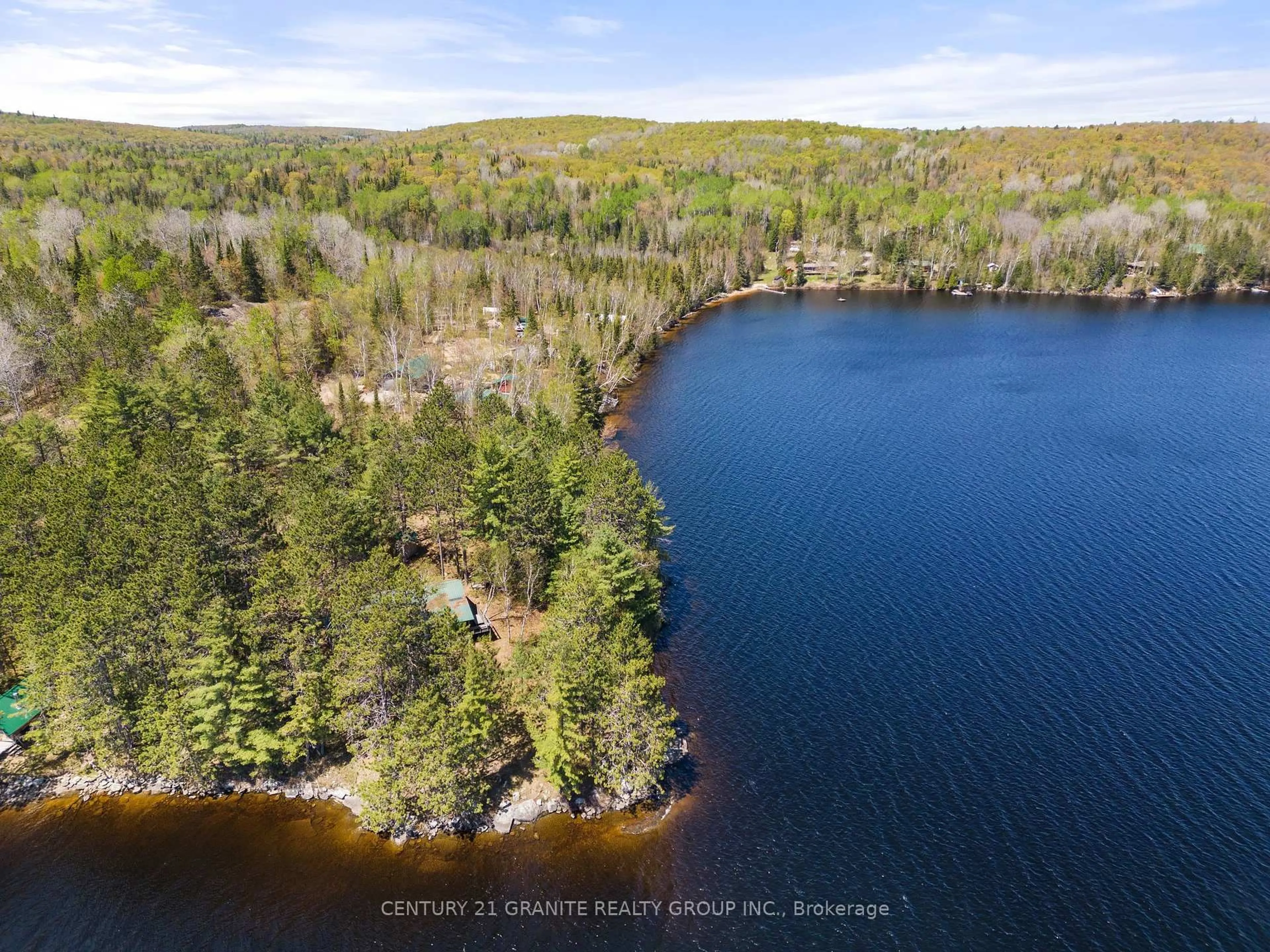 A pic from outside/outdoor area/front of a property/back of a property/a pic from drone, water/lake/river/ocean view for 39 Windmill Point Lane, South Algonquin Ontario K0J 2M0