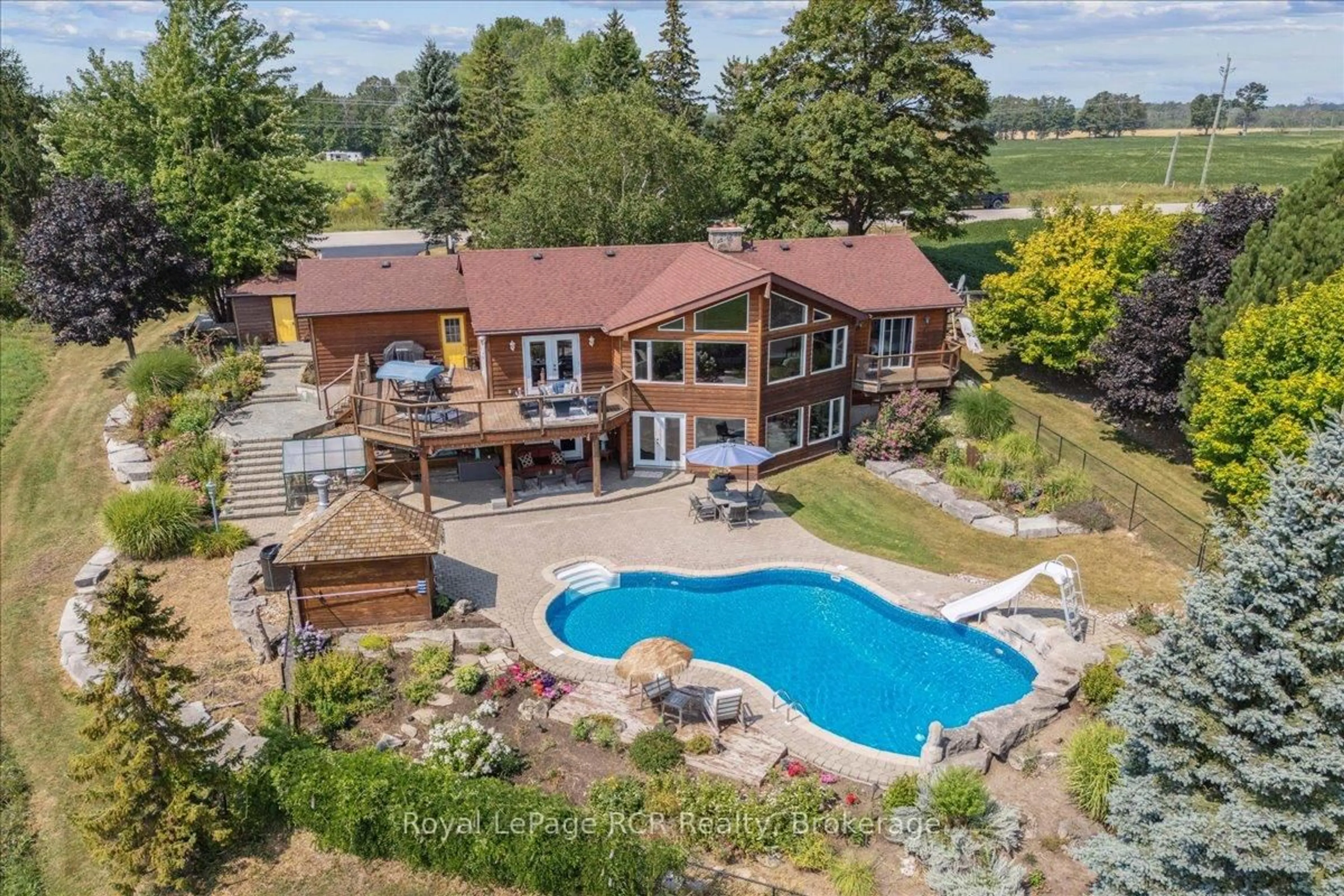 A pic from outside/outdoor area/front of a property/back of a property/a pic from drone, water/lake/river/ocean view for 196313 Grey Road 7, Grey Highlands Ontario N4L 1W7